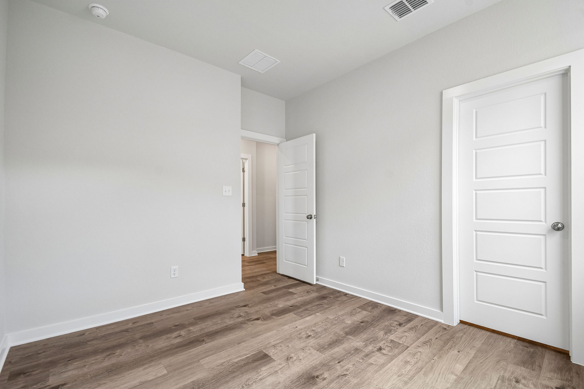 A room with white doors.