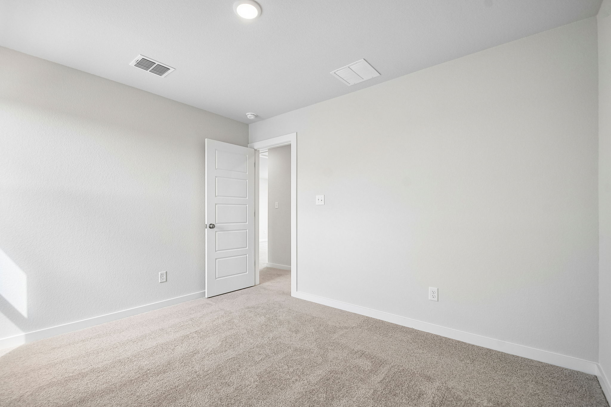 A room with white walls.