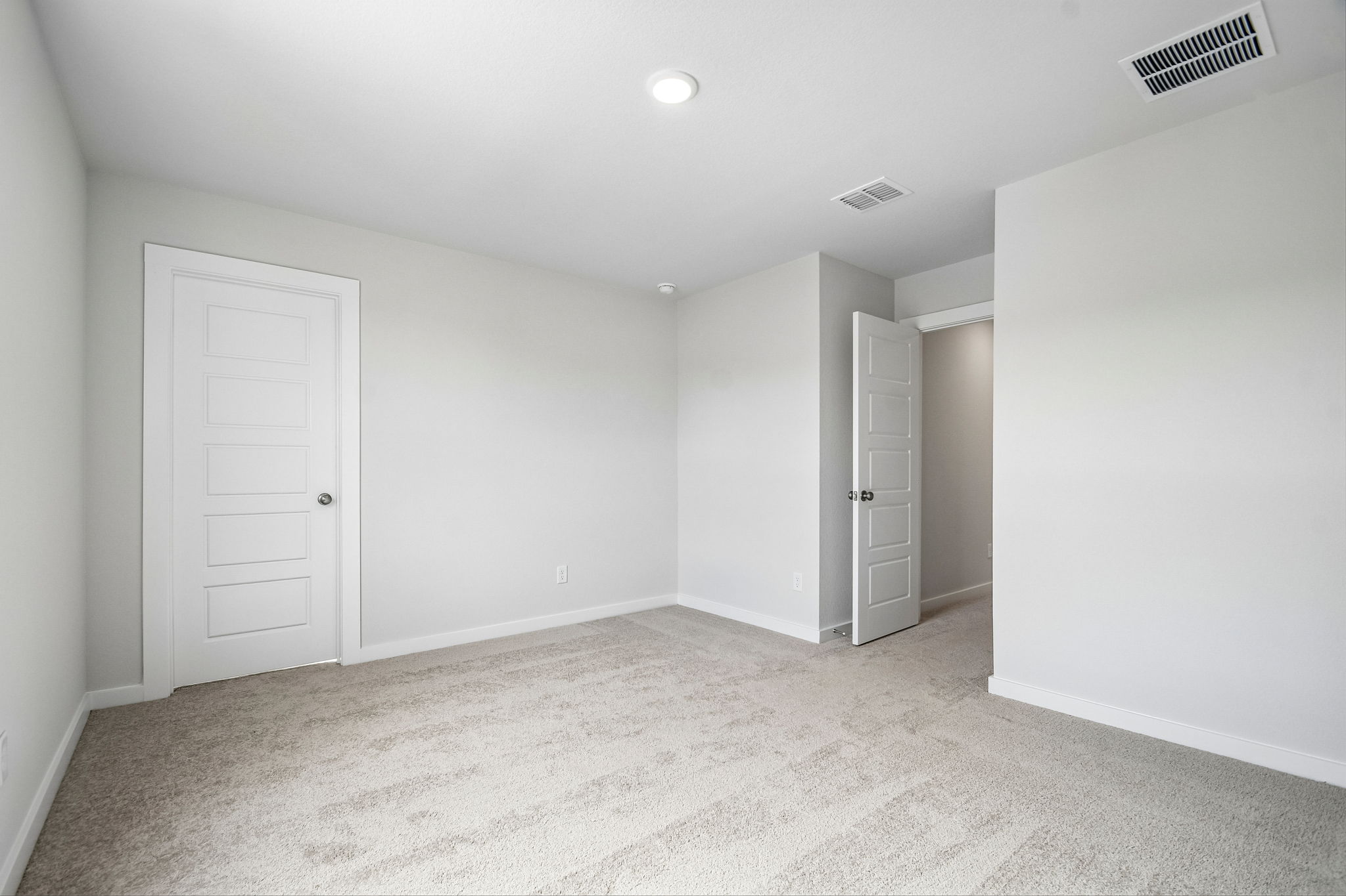 A room with white doors.