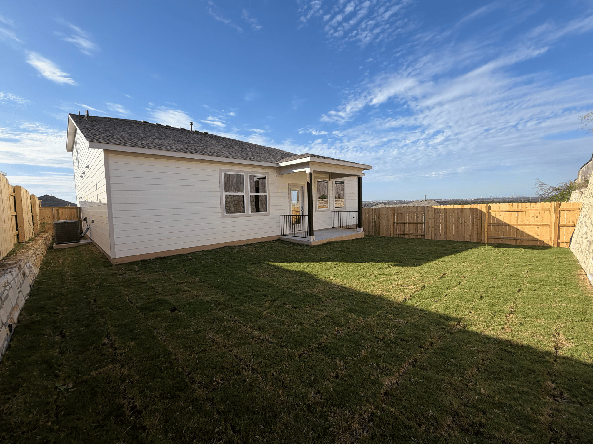 A house in a grassy area.