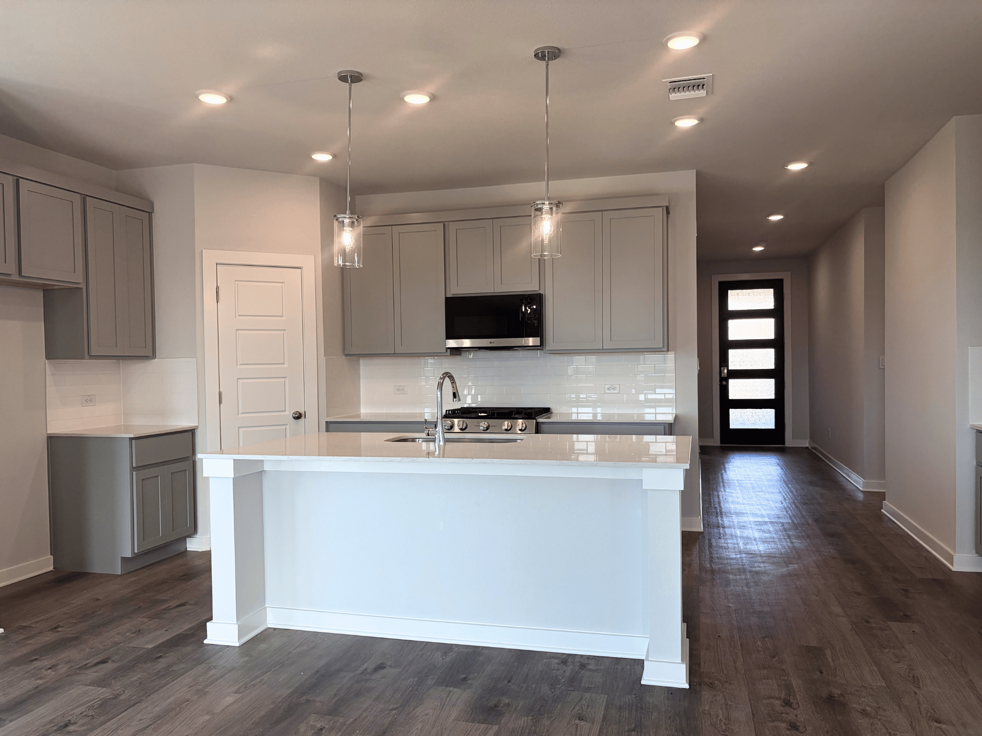 A kitchen with a large island.