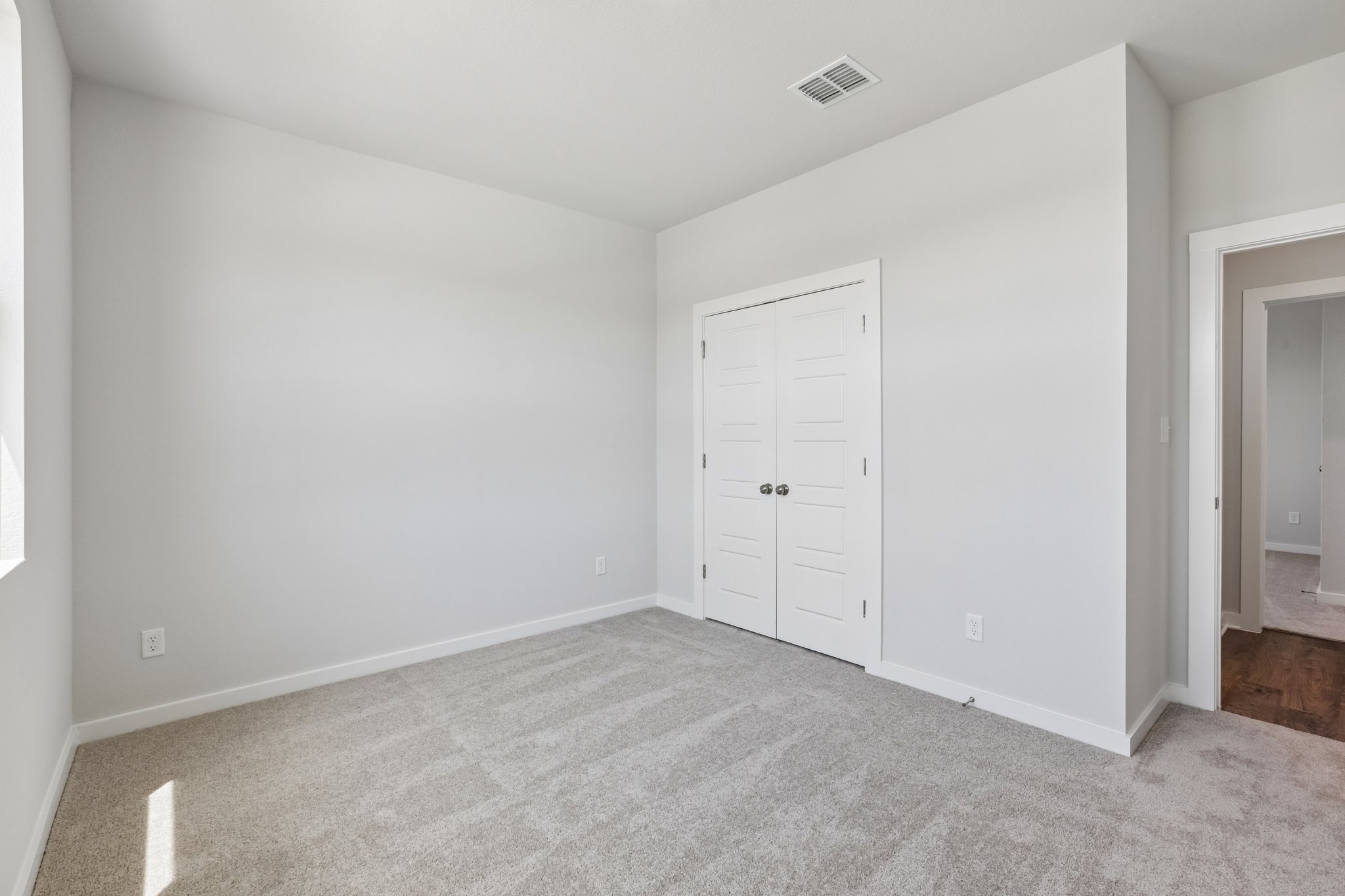 A room with white doors.