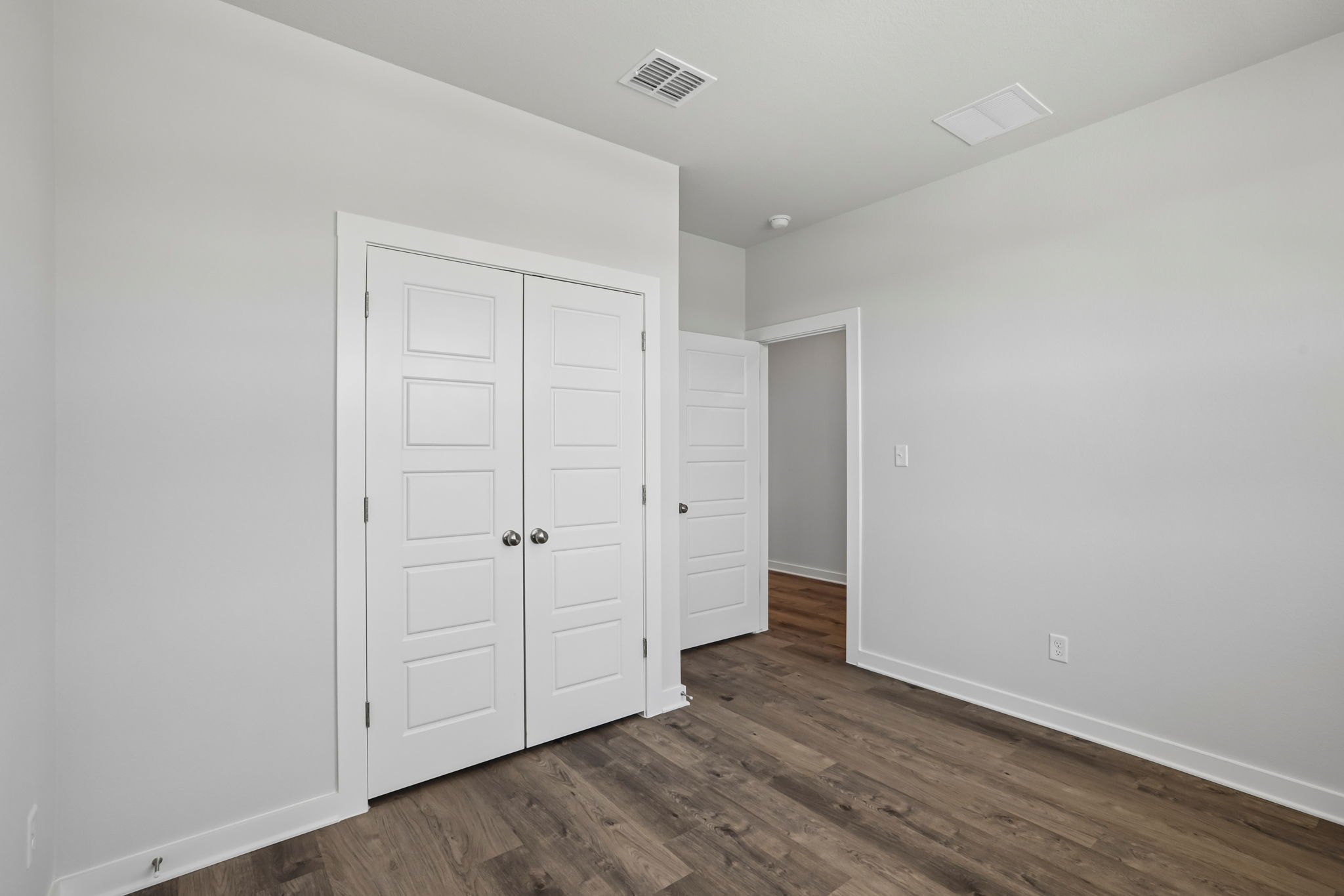 A room with white doors.