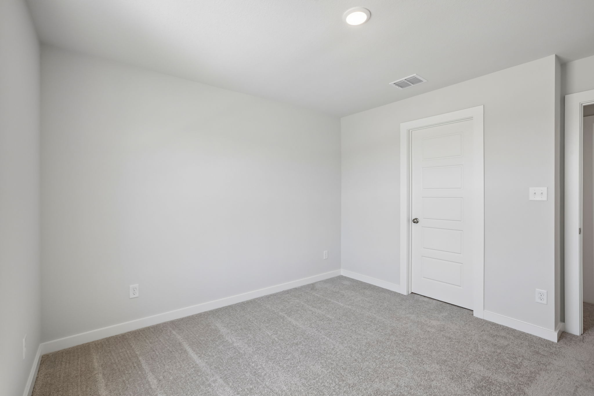 A room with white doors.