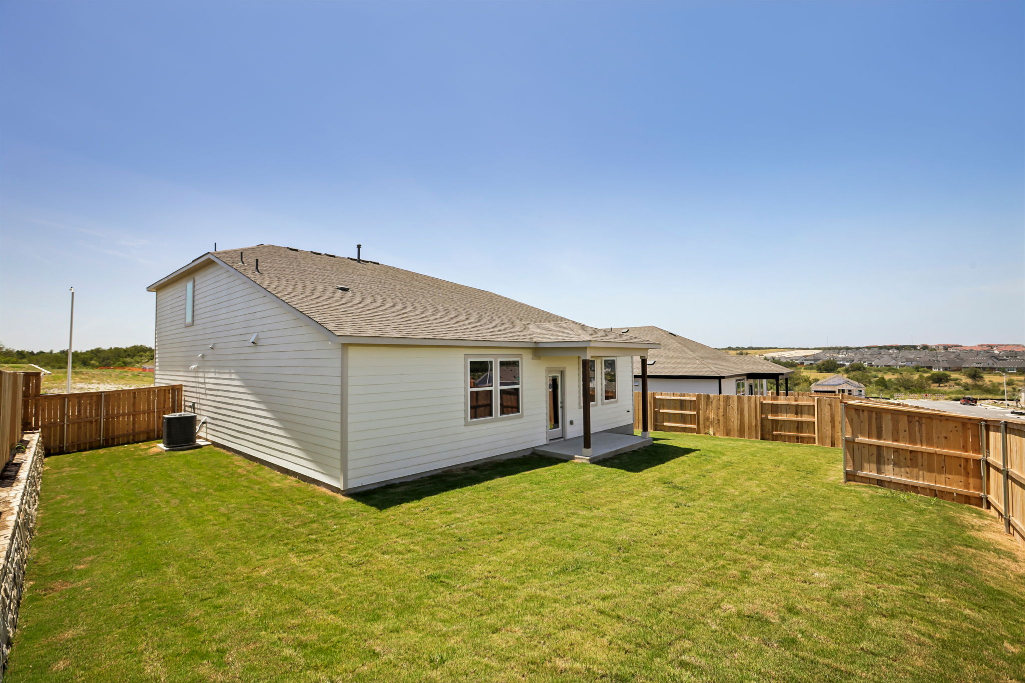 A house with a fence around it.