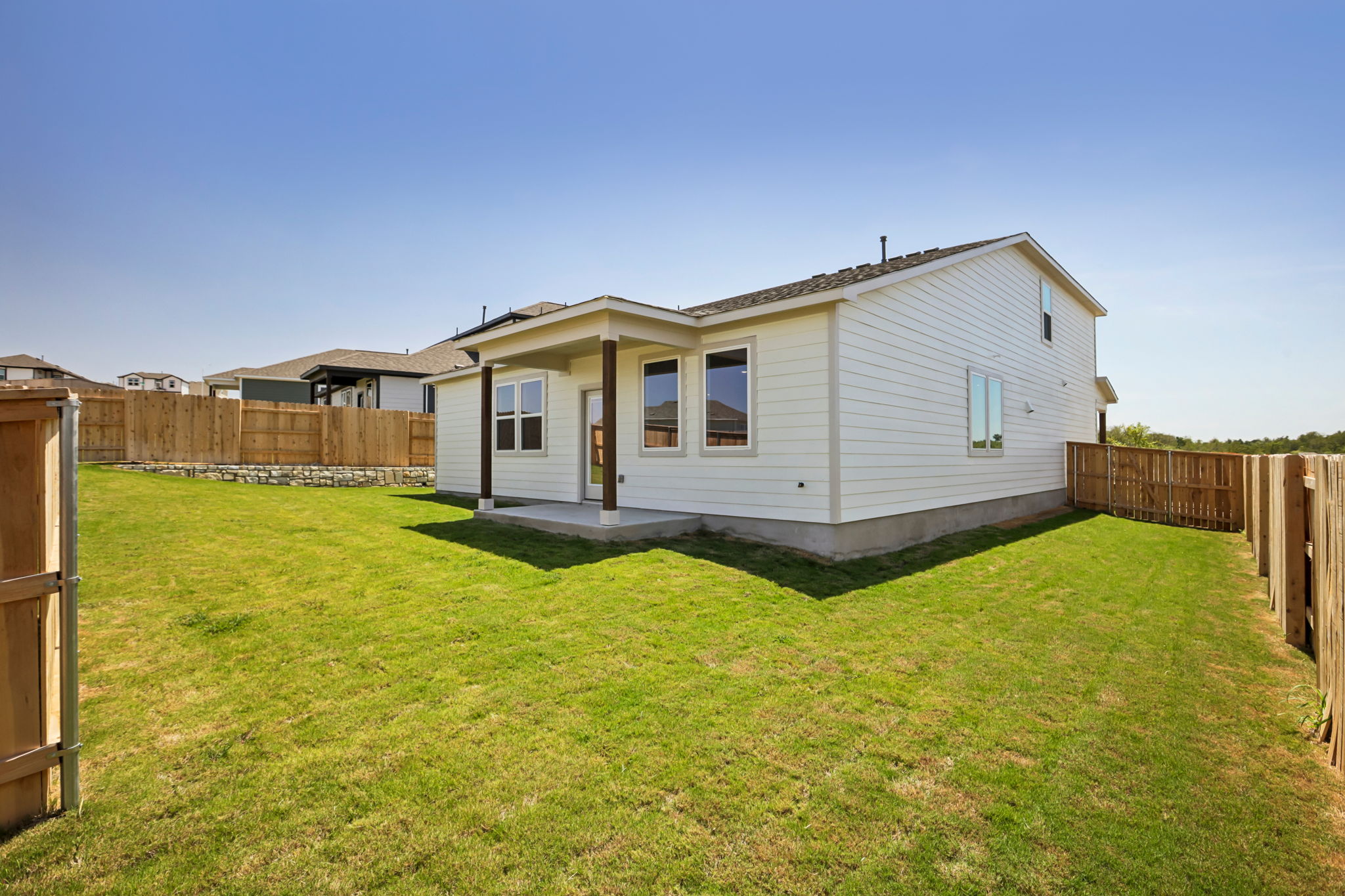 A house with a fence around it.