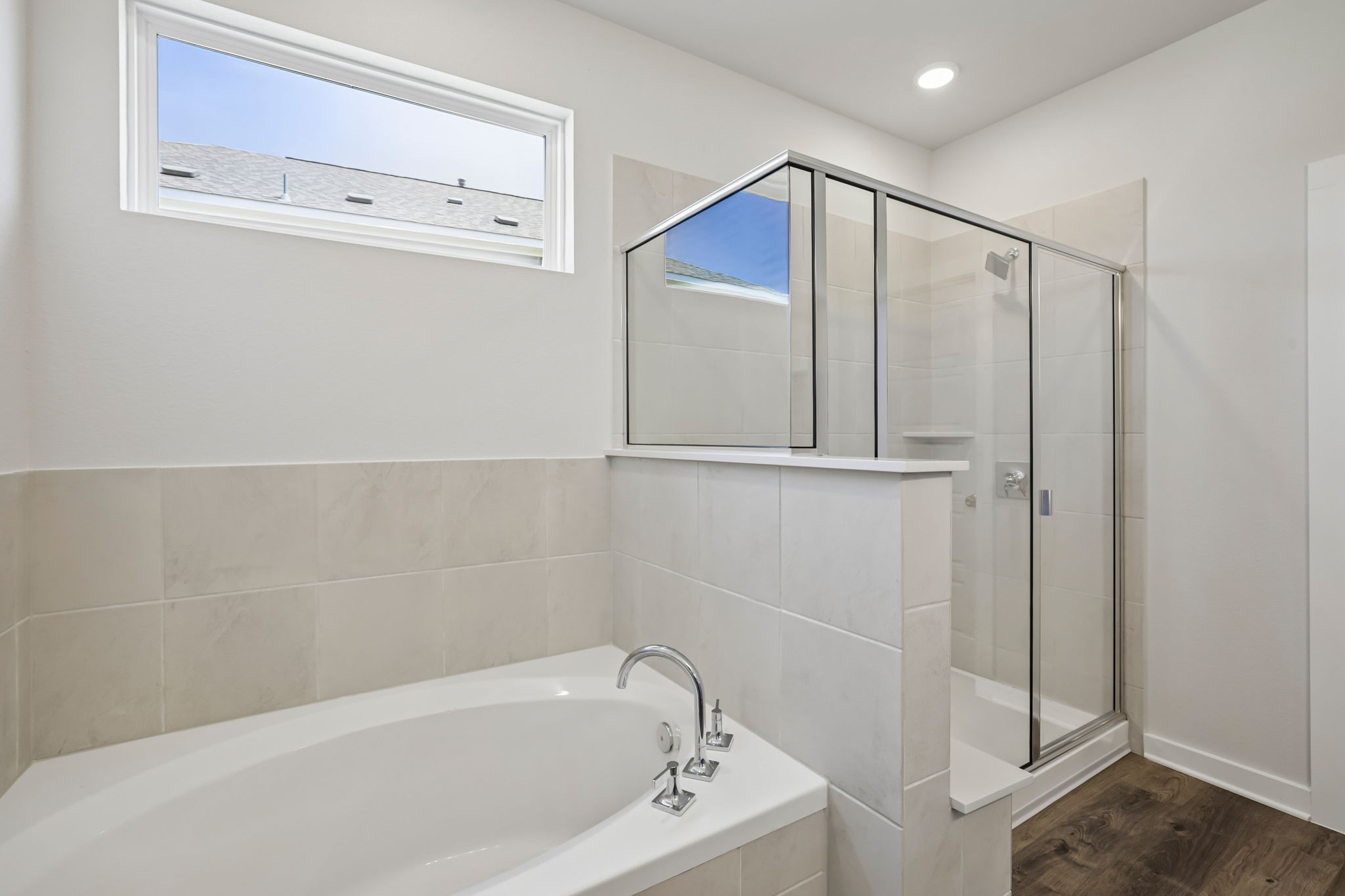 A bathroom with a glass shower.
