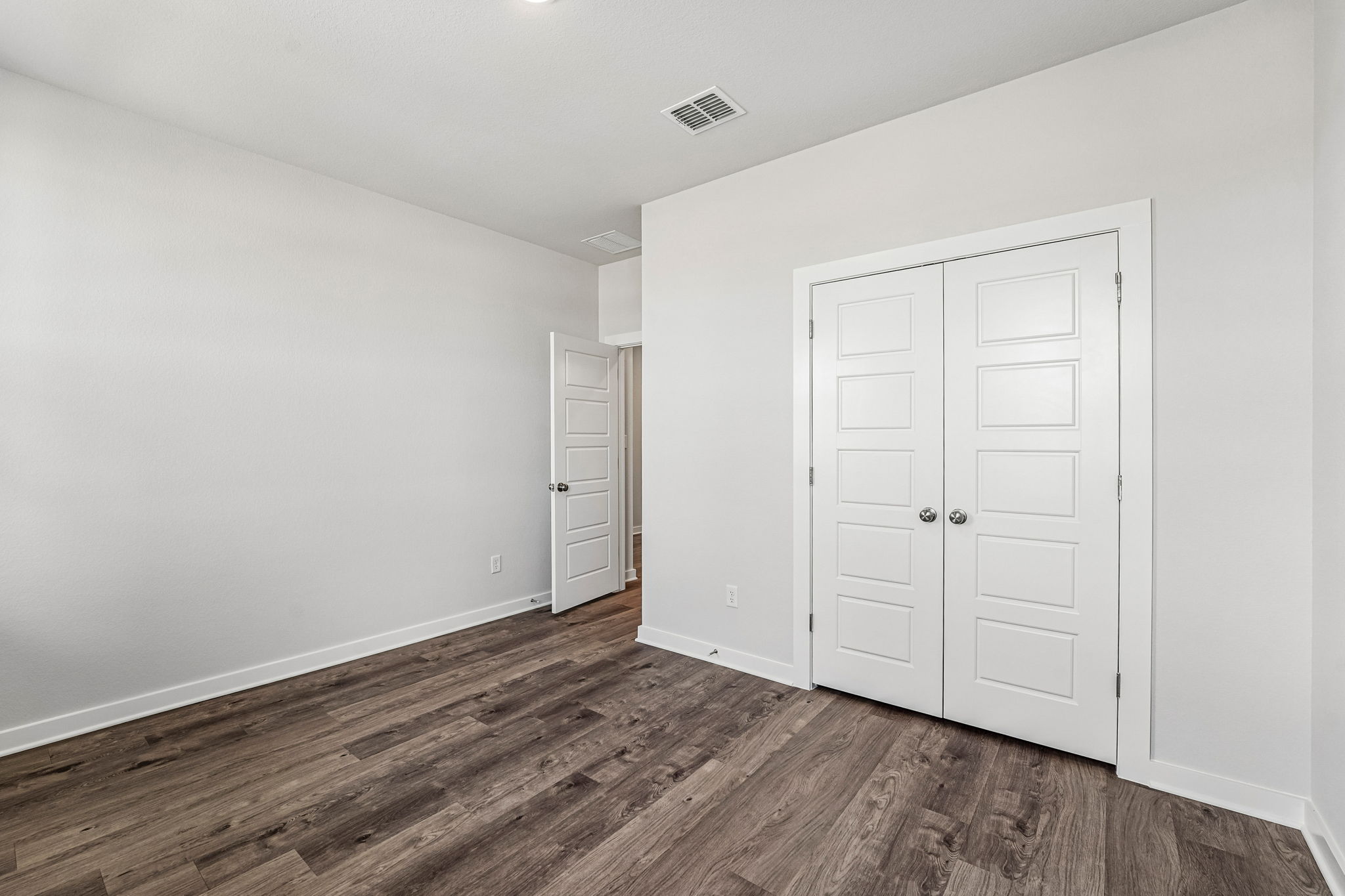 A room with white doors.