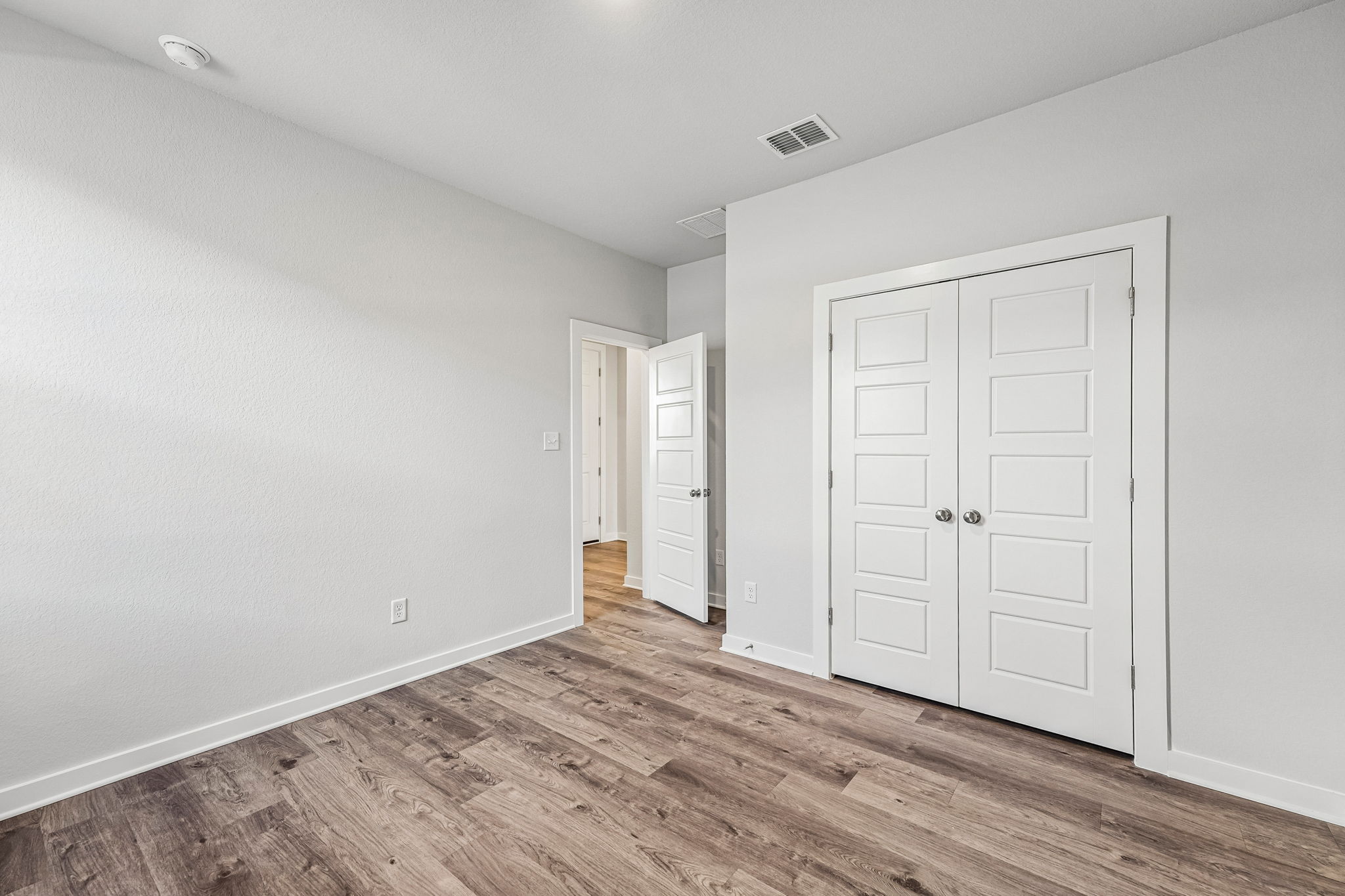 A room with white doors.