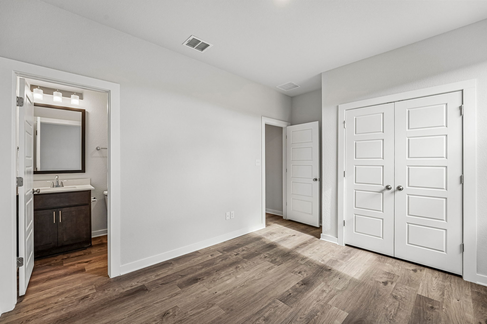 A room with white doors.