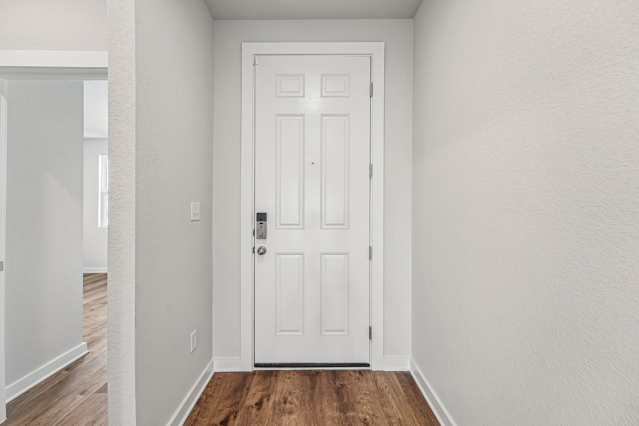 A white door in a room.