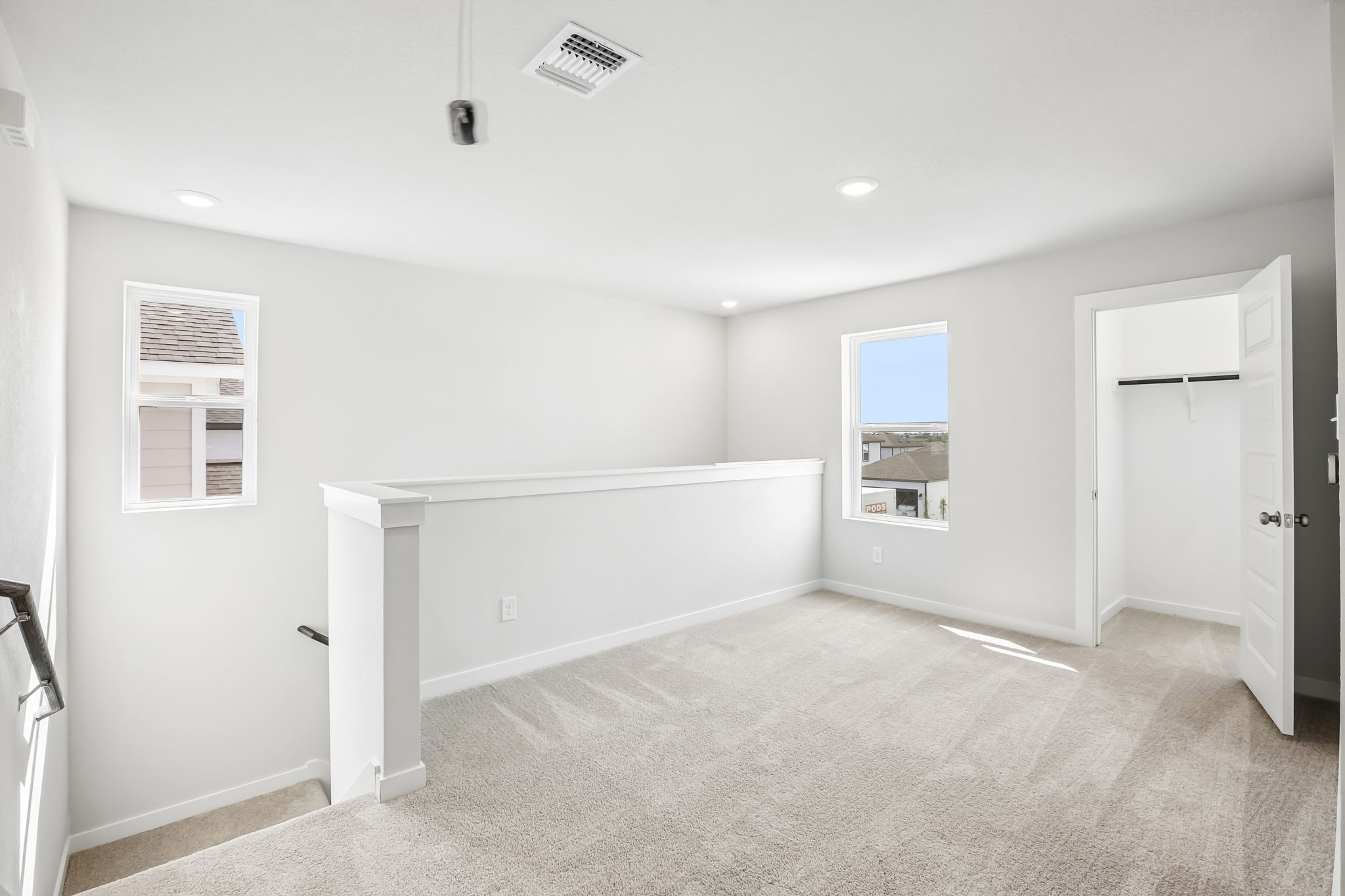 A room with a white wall and a white floor.