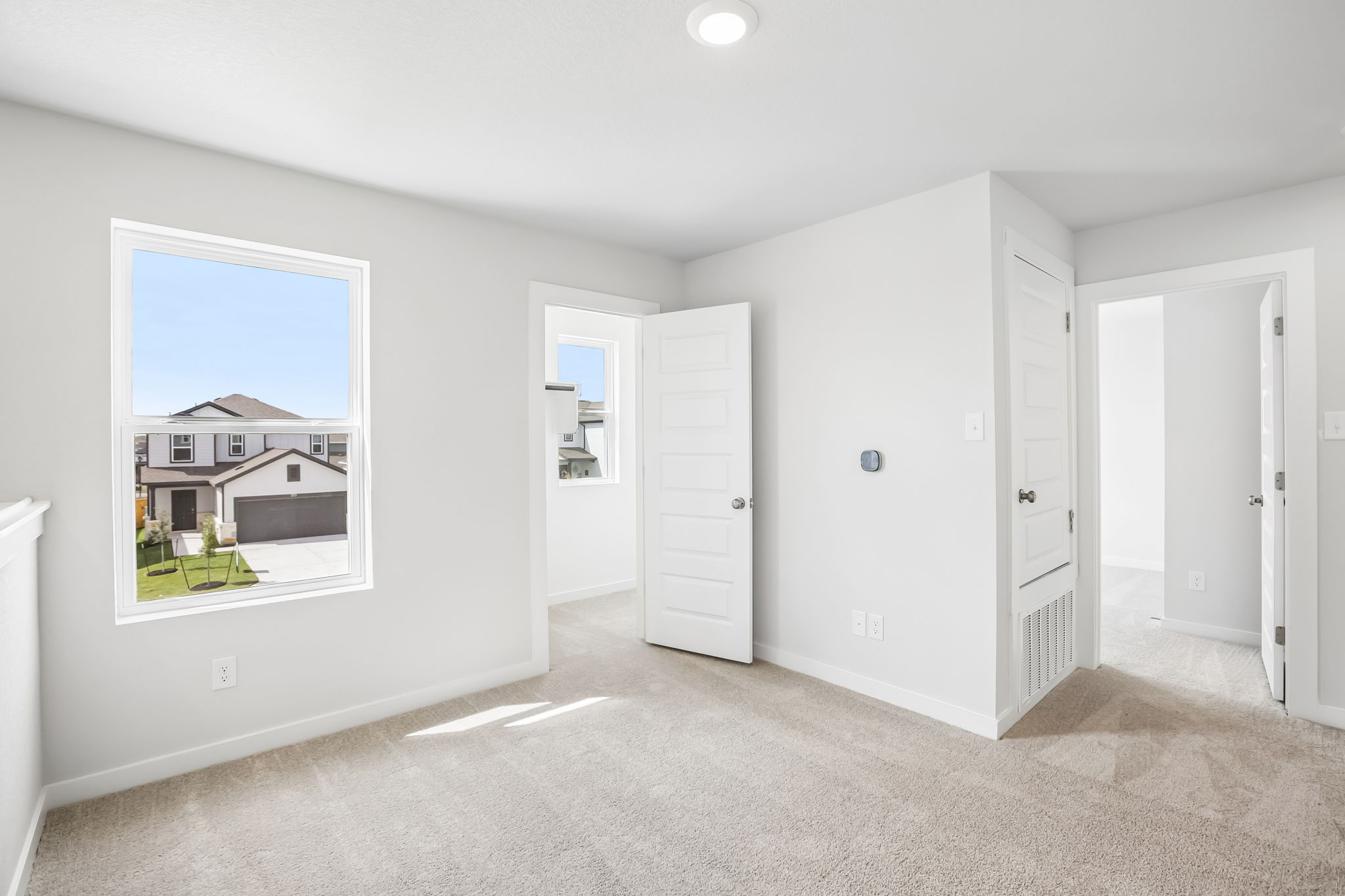 A room with white doors.