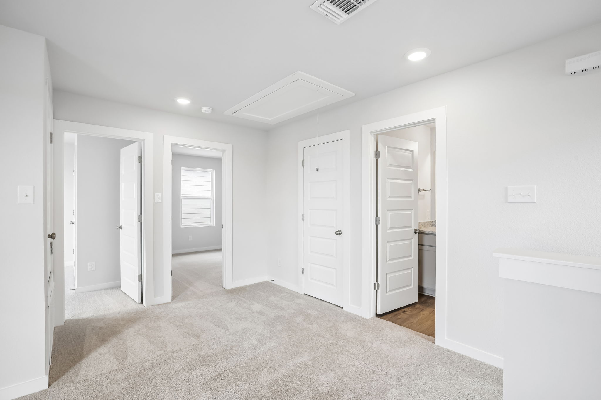 A room with white doors.
