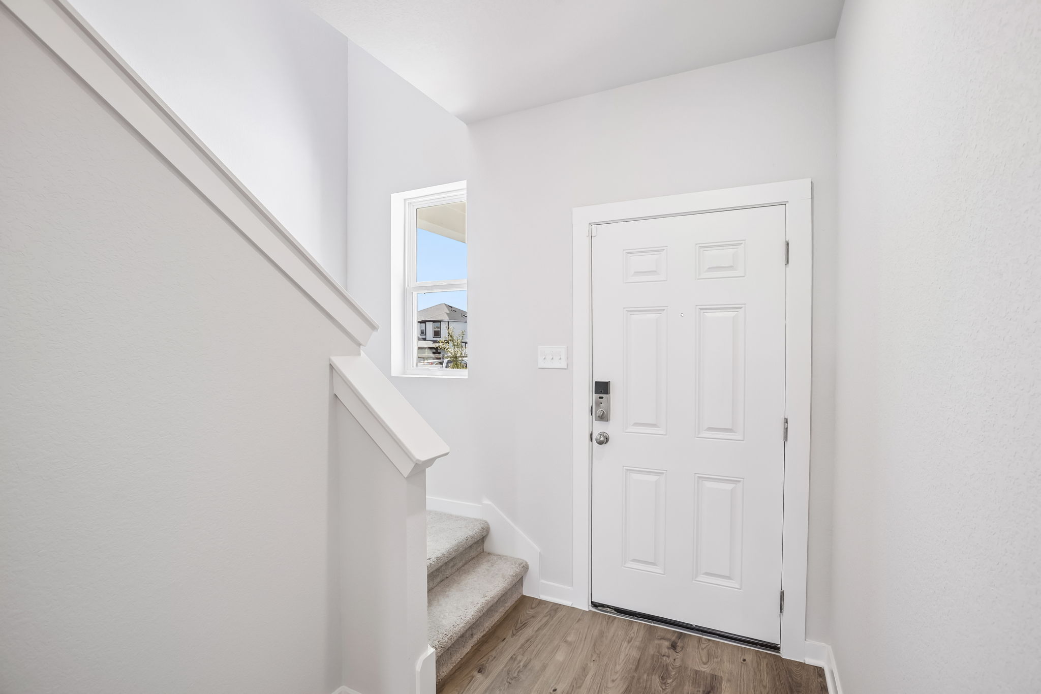 A white door in a room.