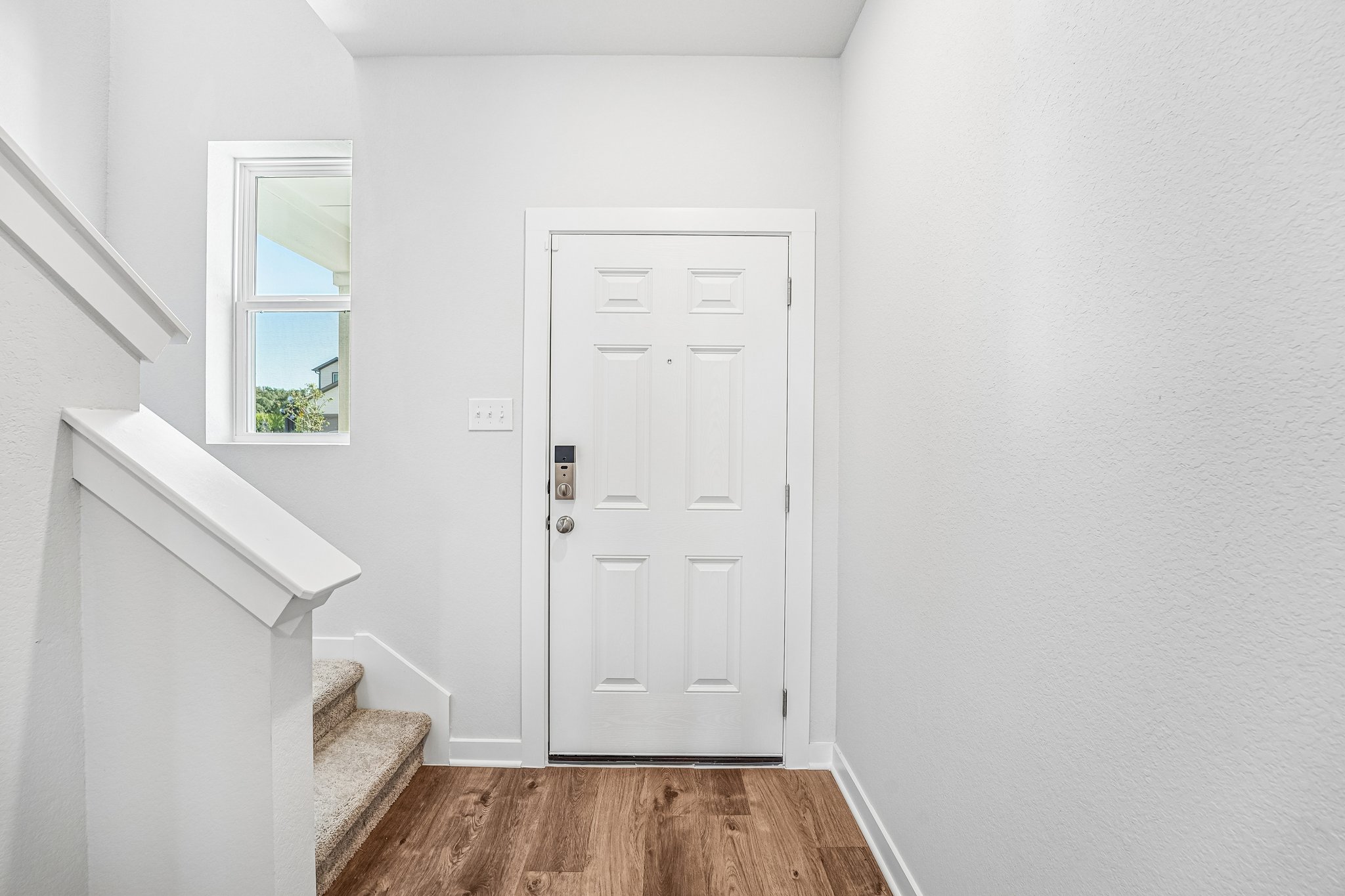 A white door in a room.