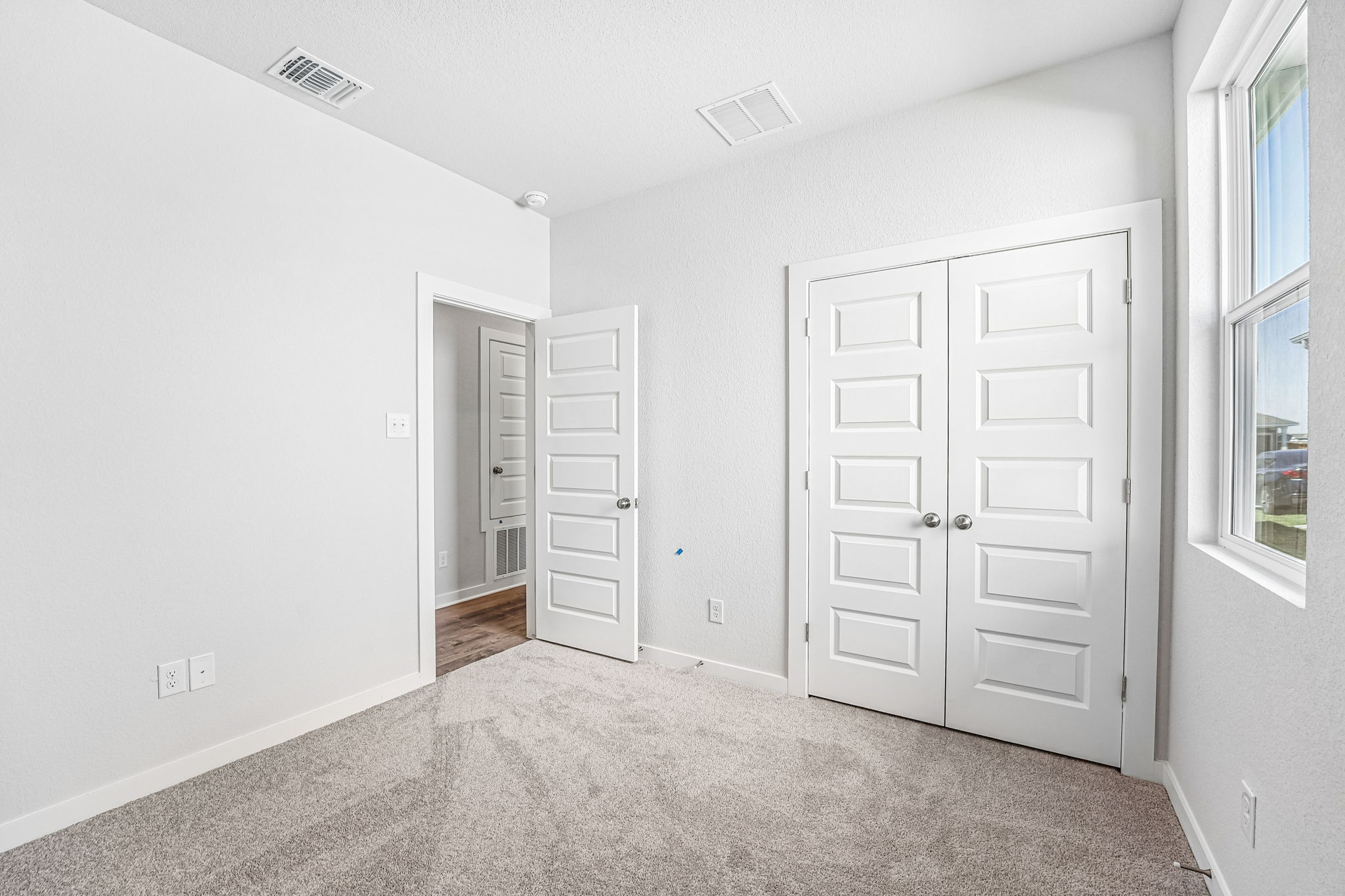 A room with white doors.