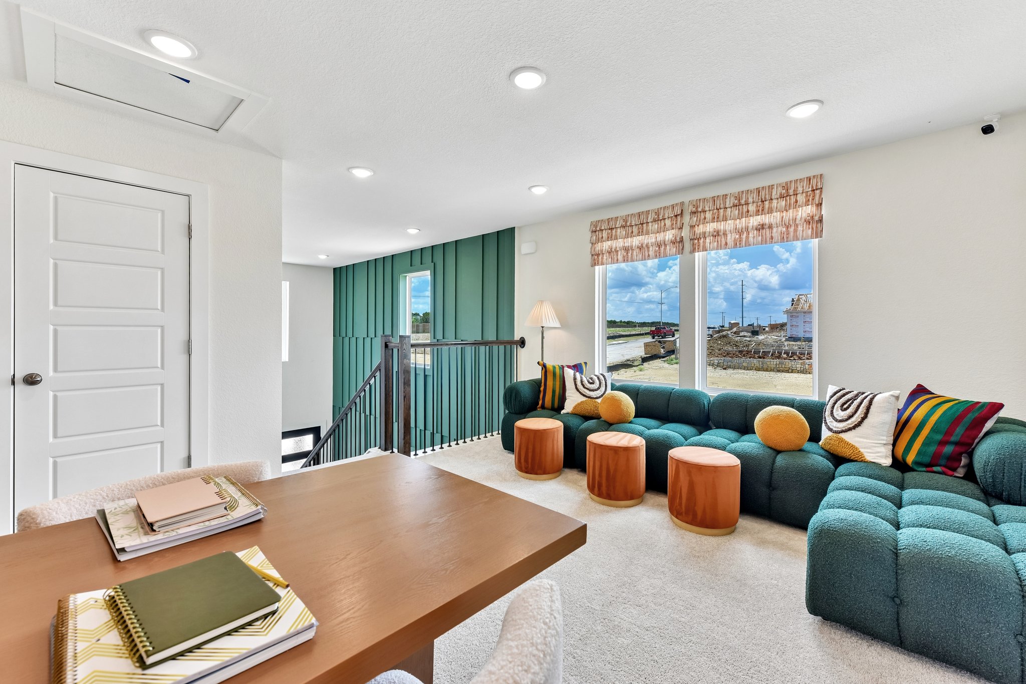 A living room with a table and couches.