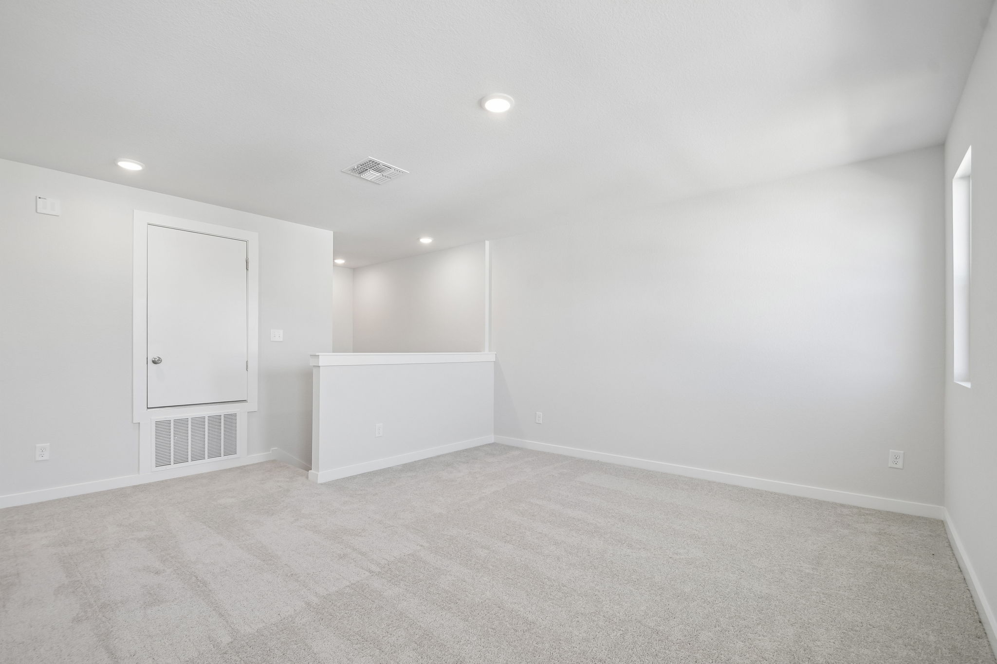 A room with white walls.