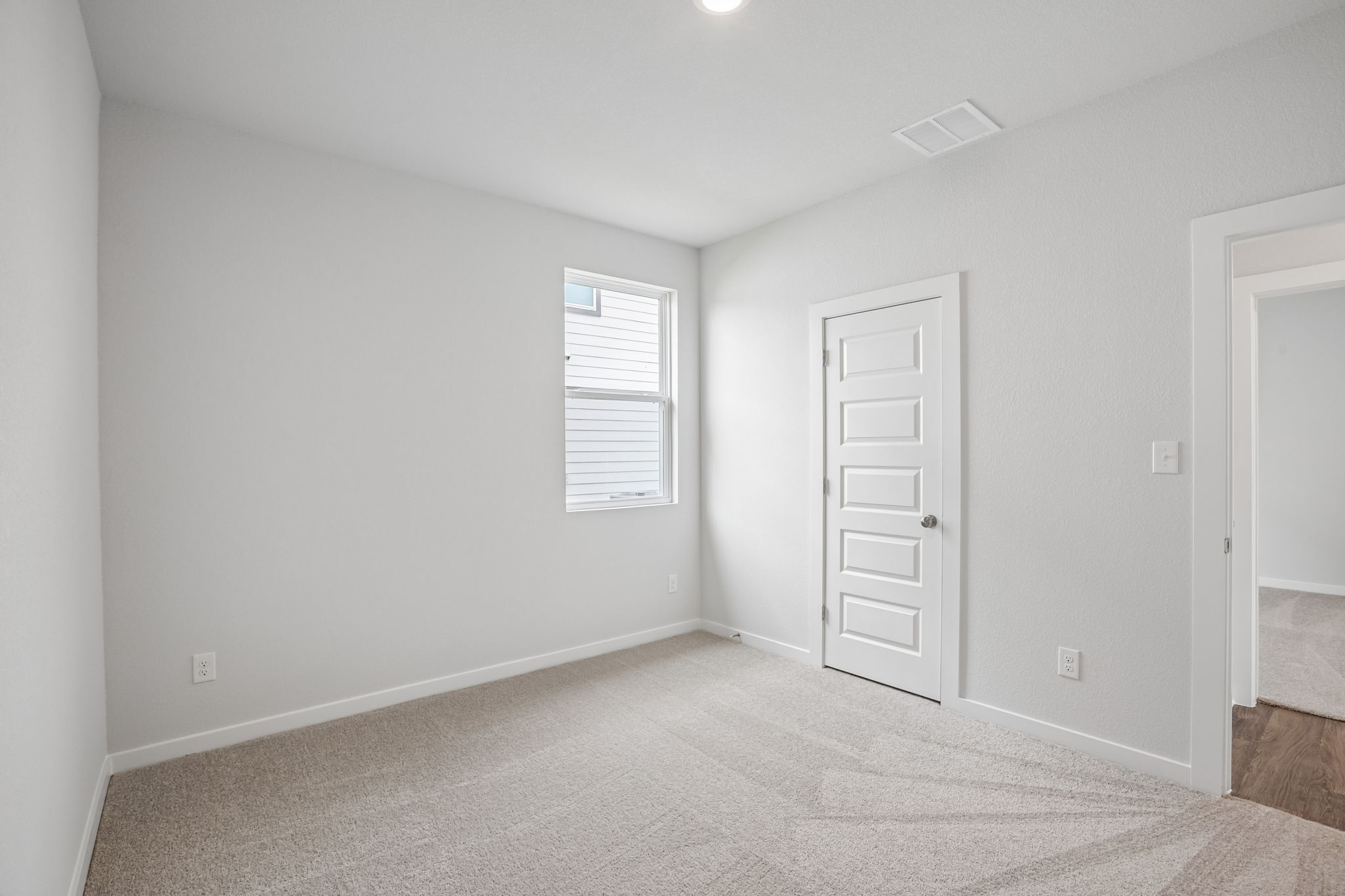 A room with white doors.
