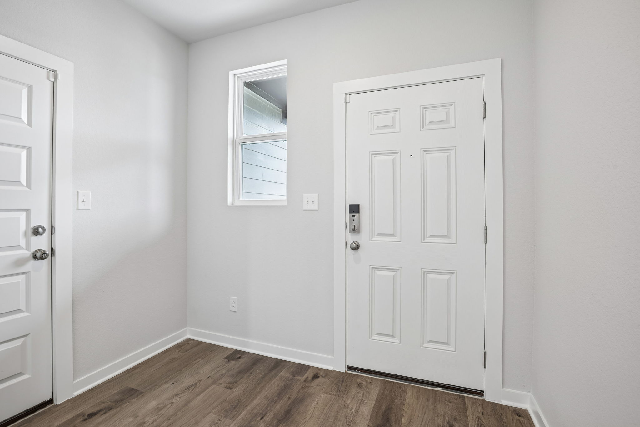 A white door in a room.