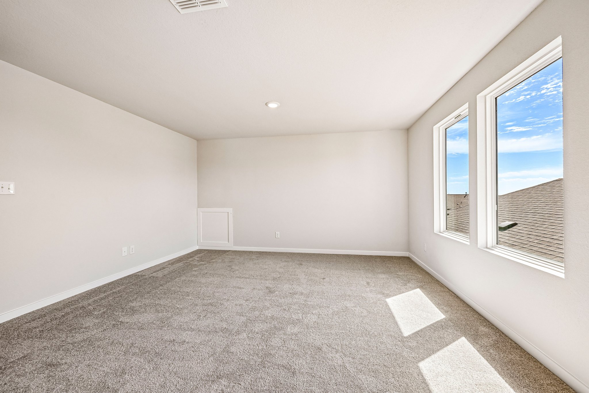 A room with a large window.