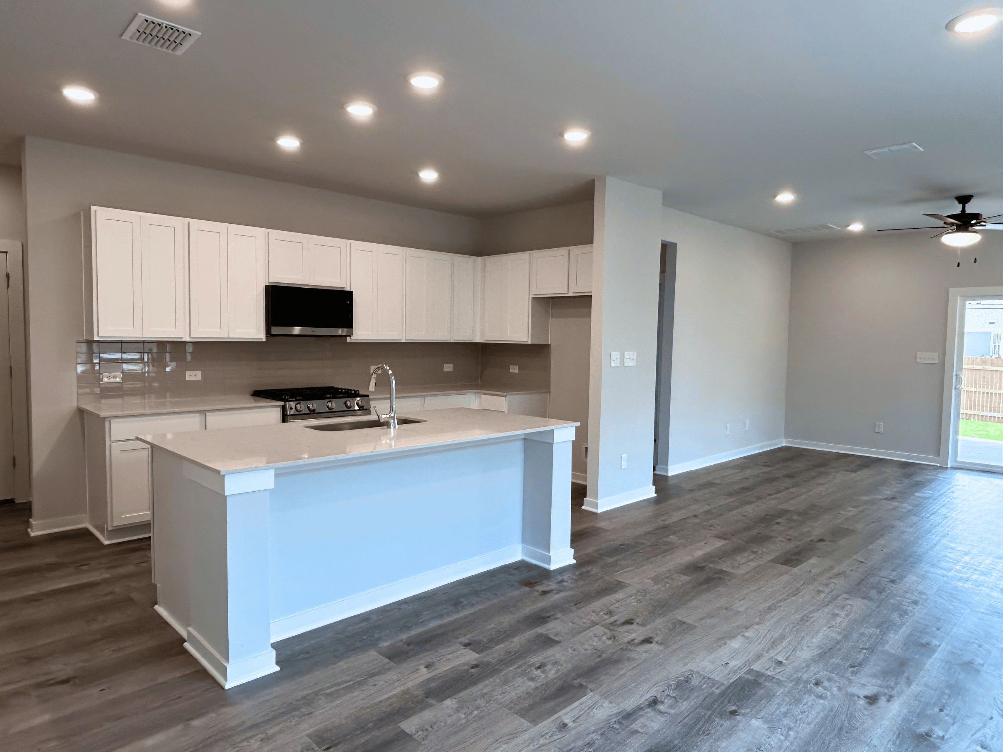 A kitchen with a large island.