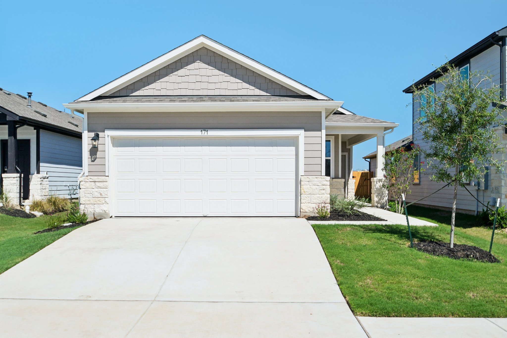A white garage with a garage.