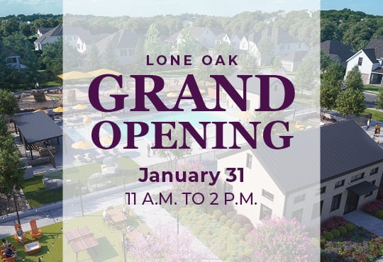 A sign with a town in the background.