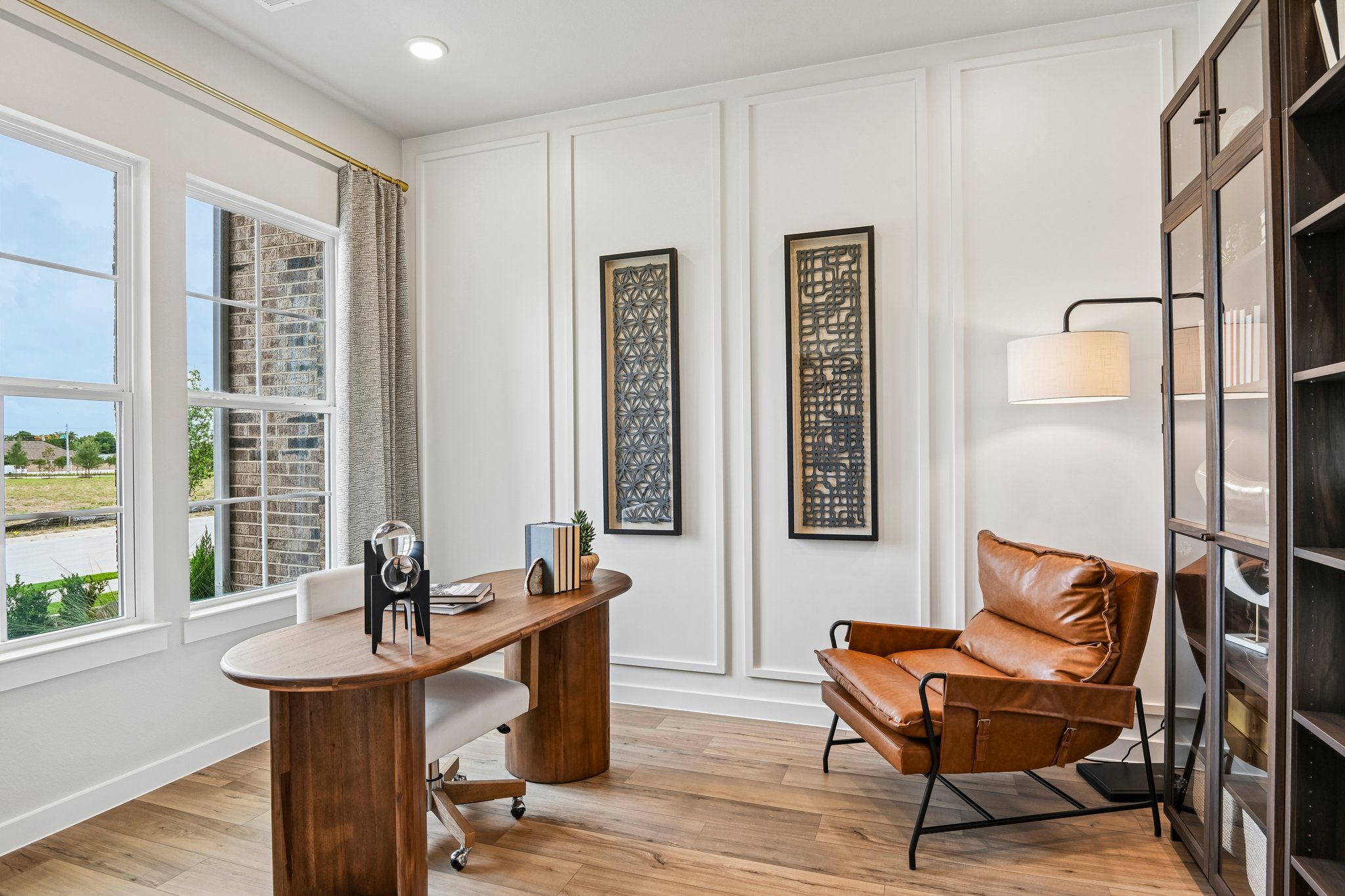 A room with a table and chairs.