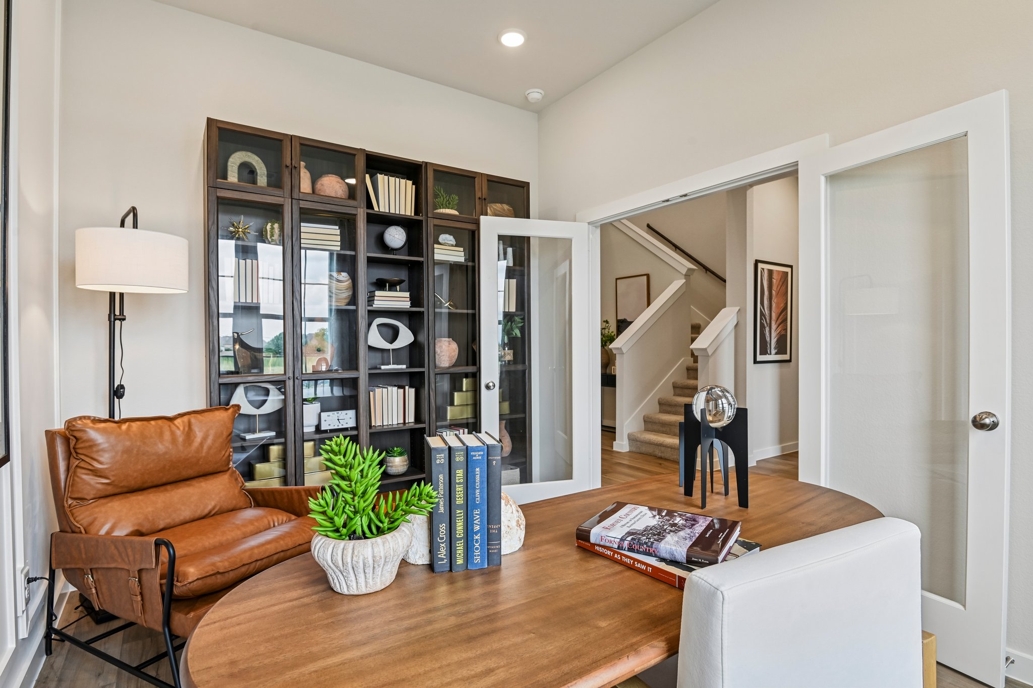 A living room with a glass door.