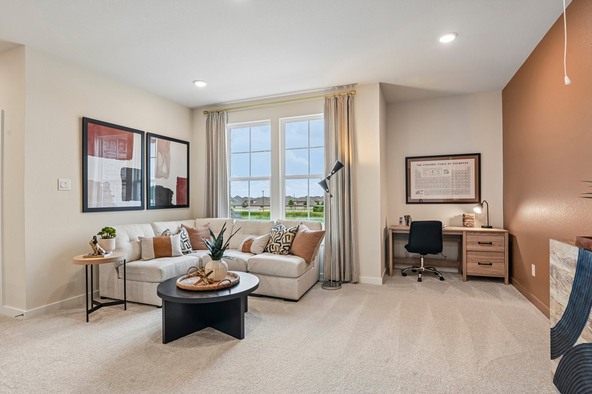 A living room with a couch and a coffee table.