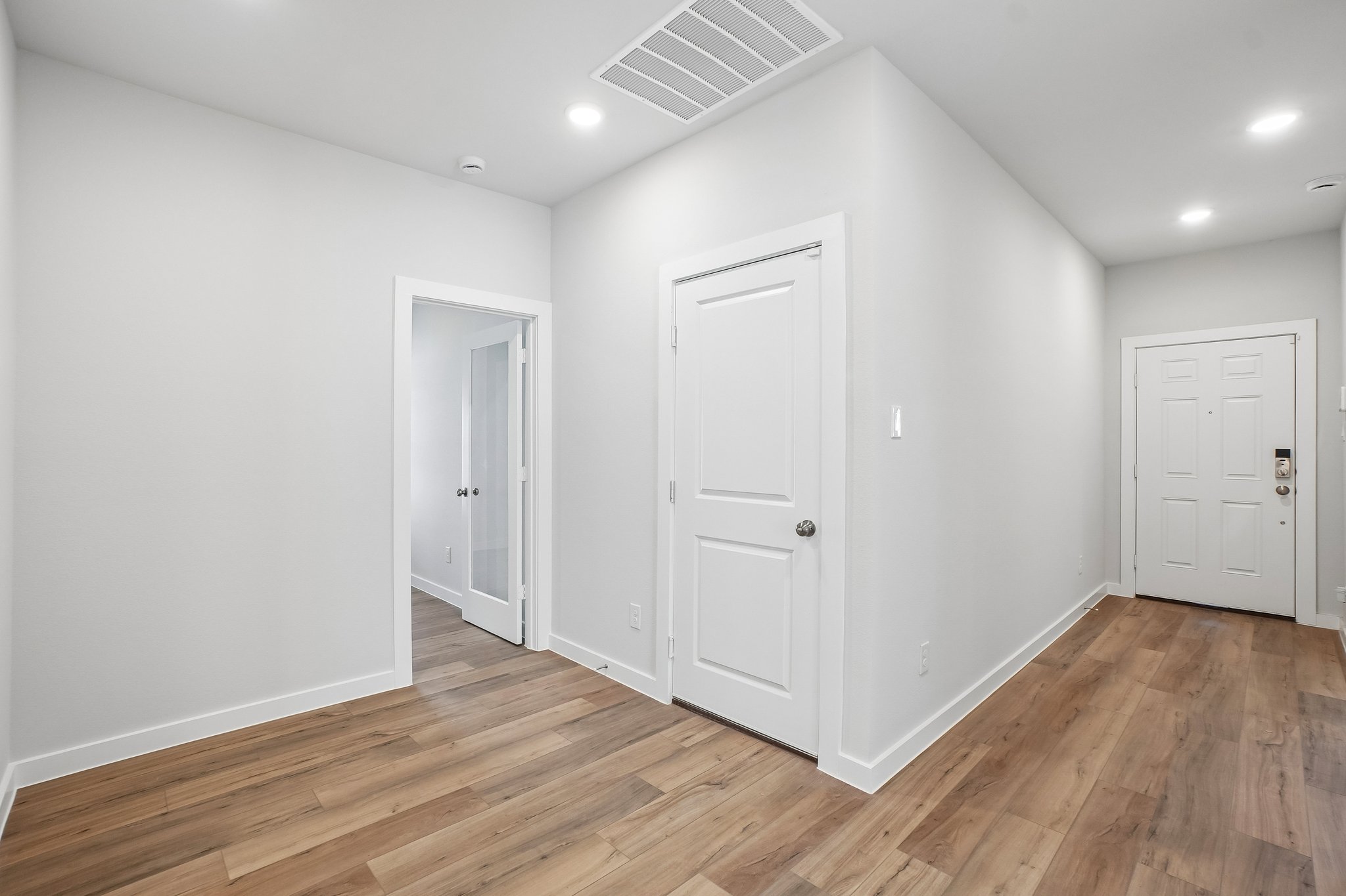 A room with white doors.