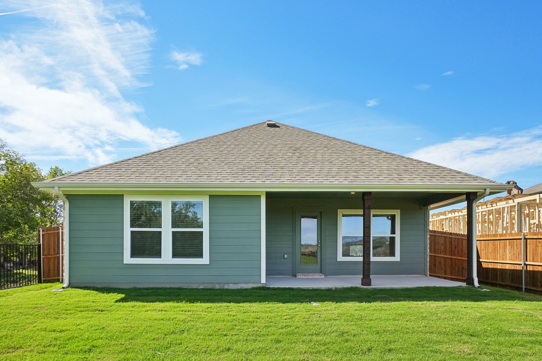 A house with a fence around it.
