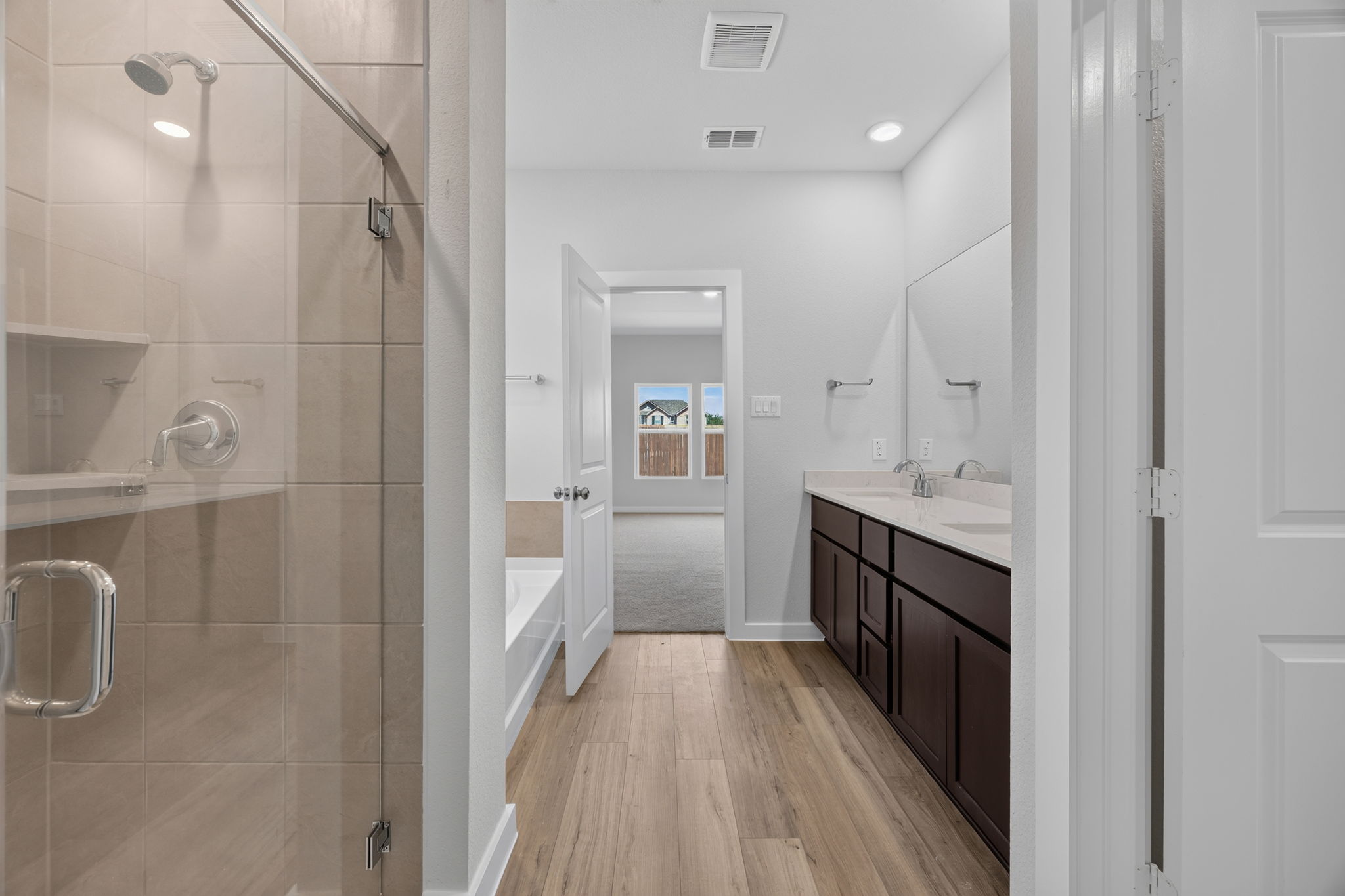 A bathroom with a glass shower.