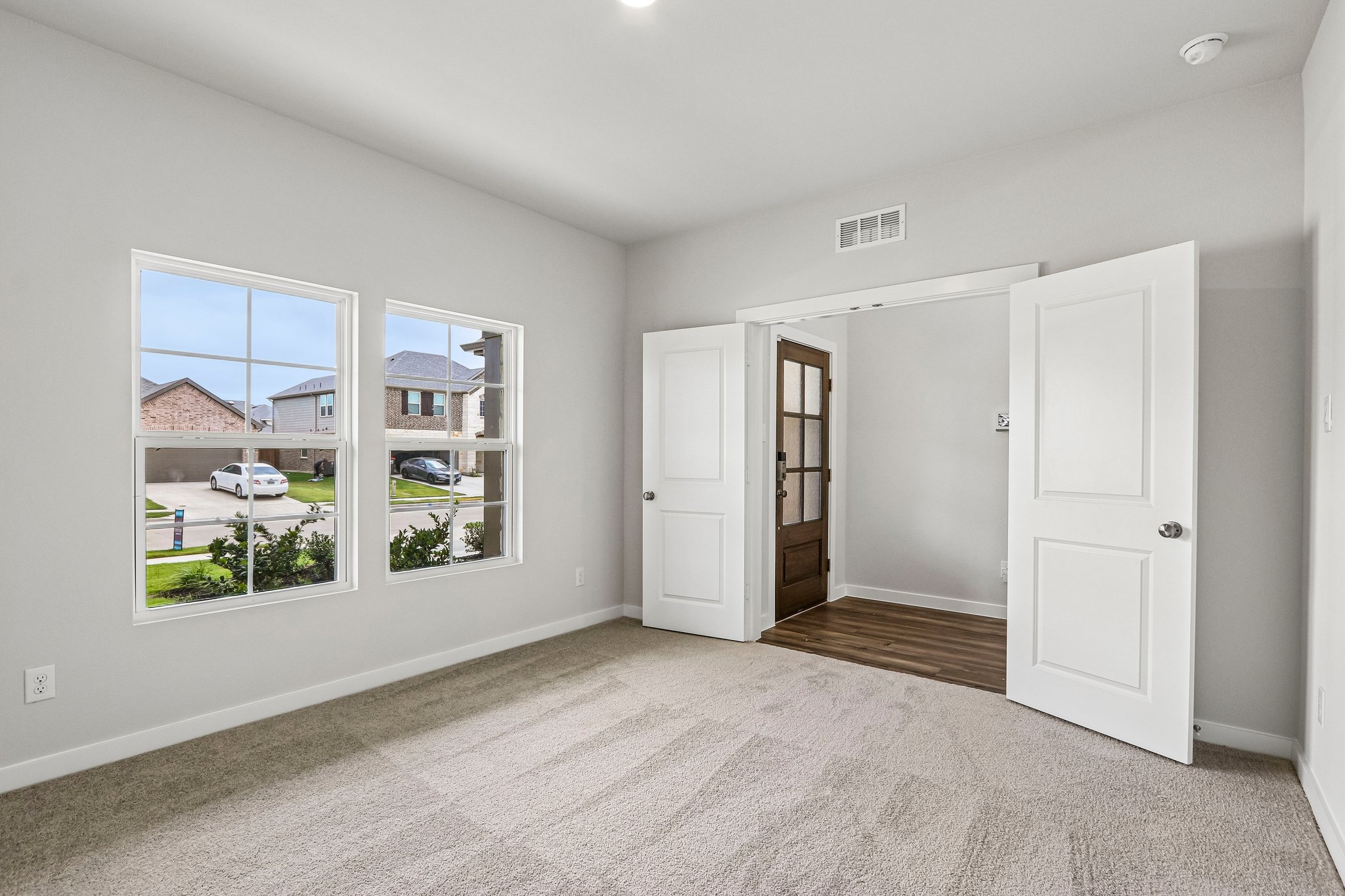 A room with white doors.