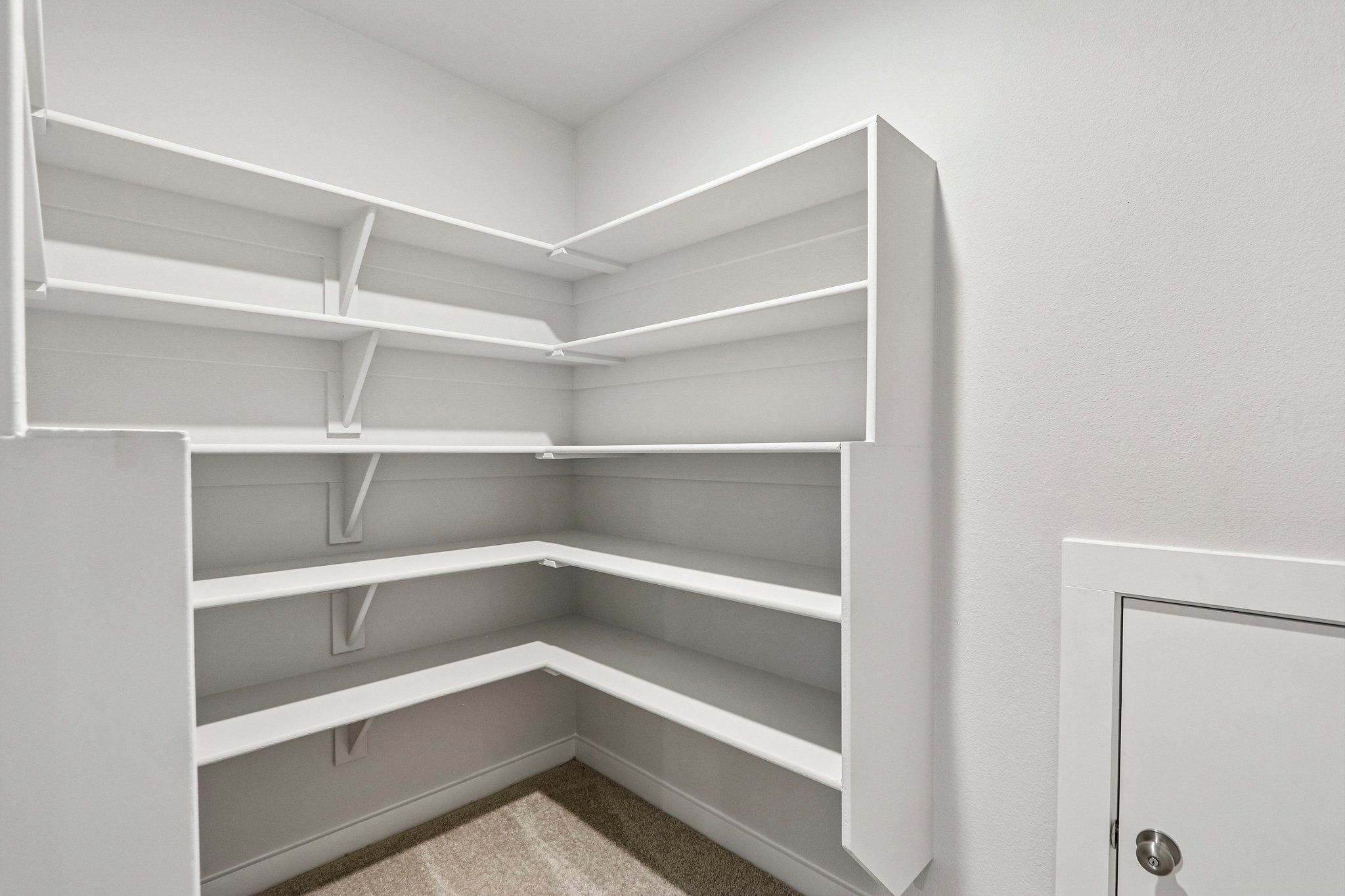 A white shelf with white shelves.