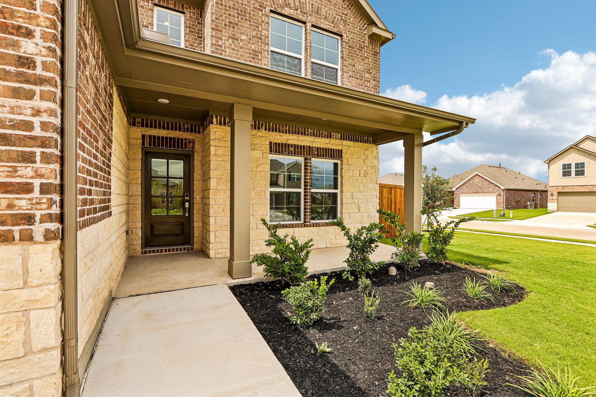 A house with a front yard.