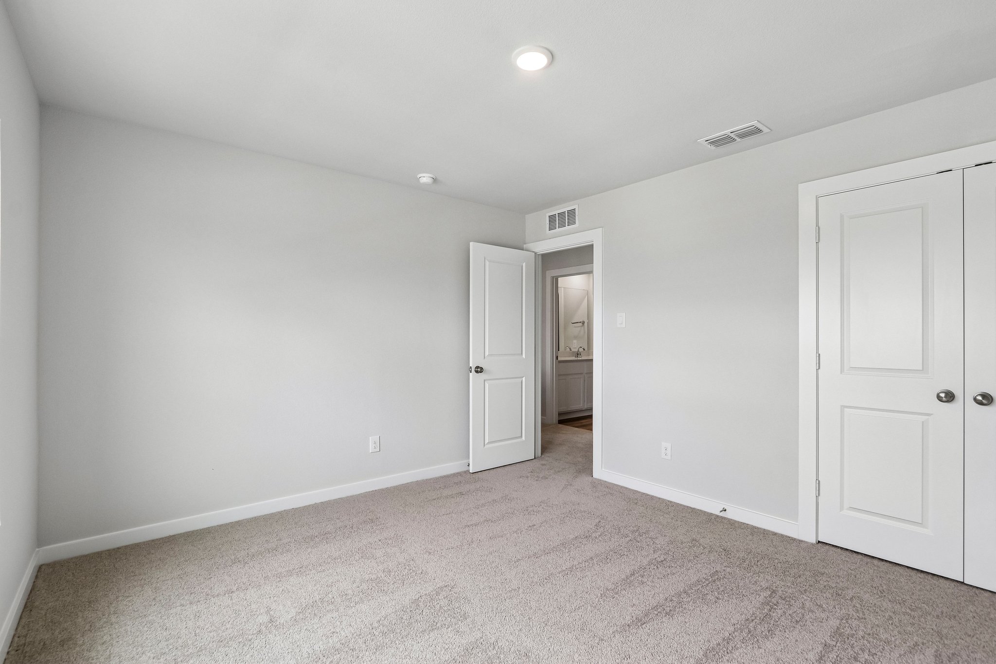 A room with white doors.