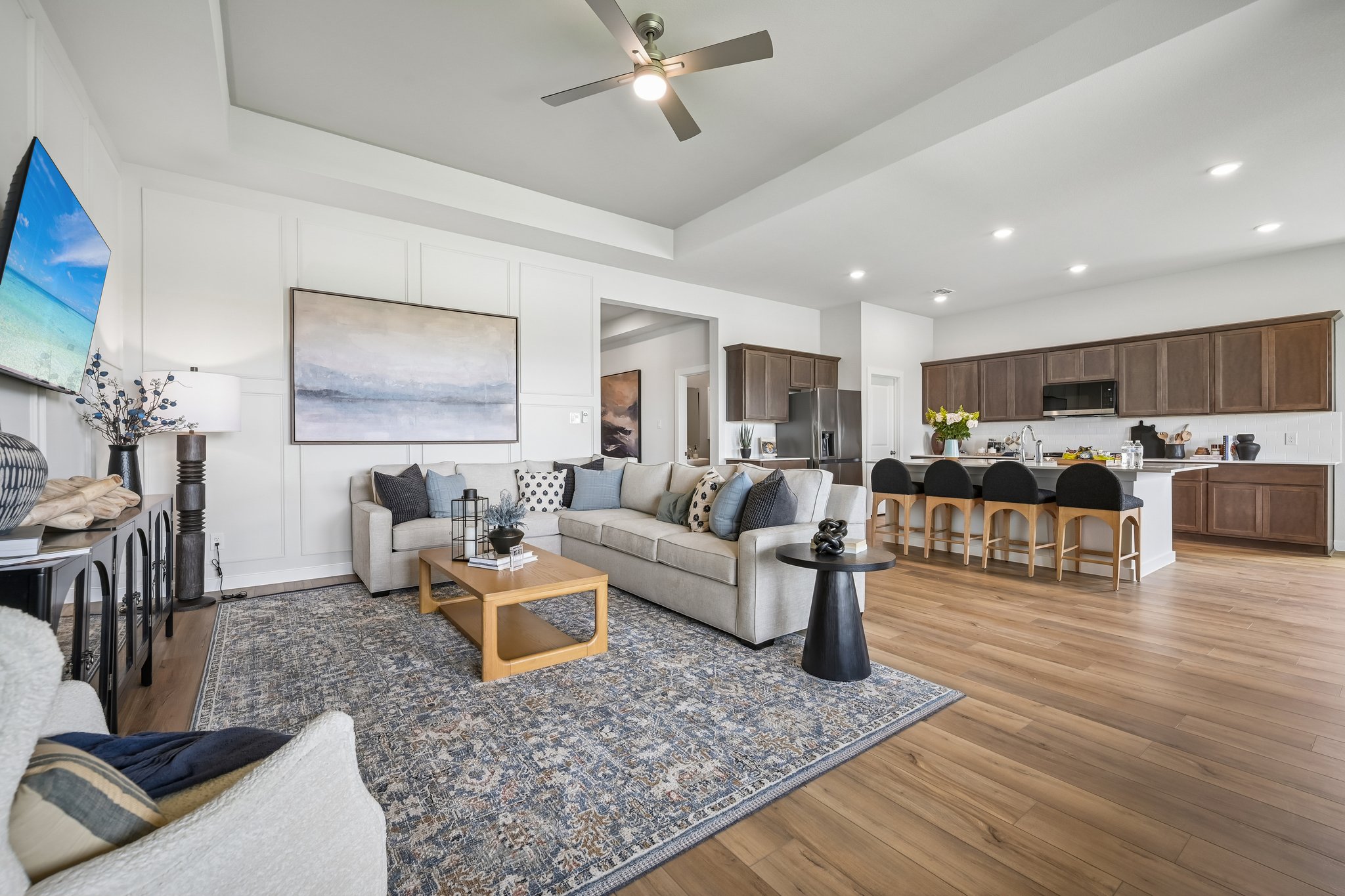 A large living room with a large island and a large island.