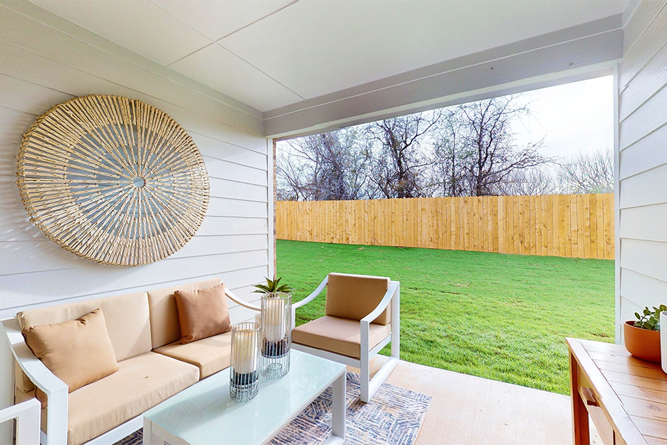 A living room with a large green lawn.