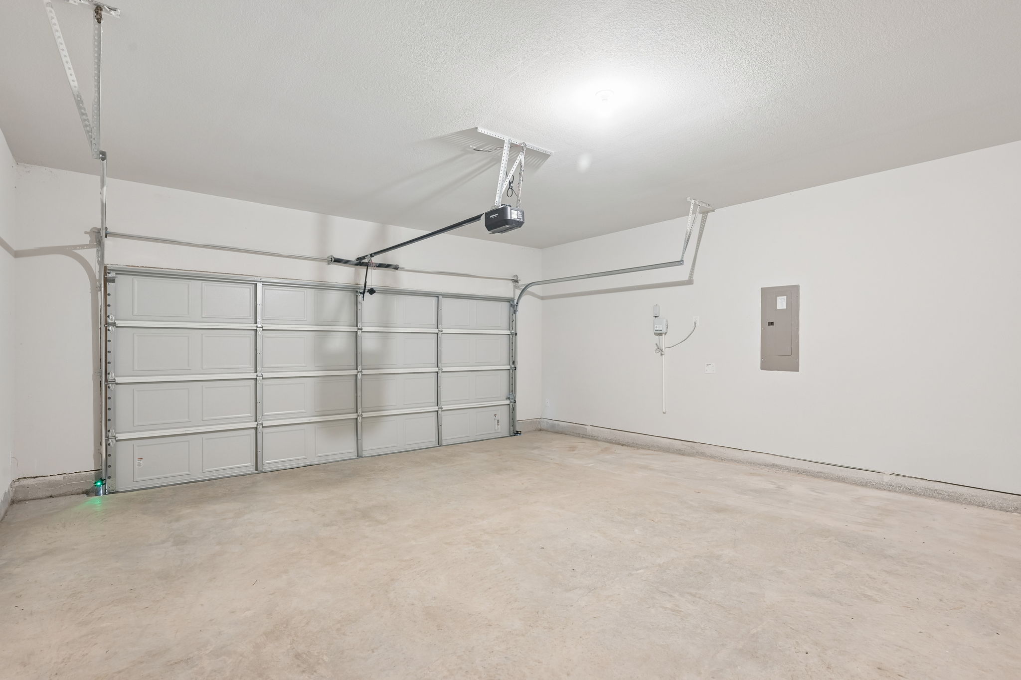 A room with a metal gate.