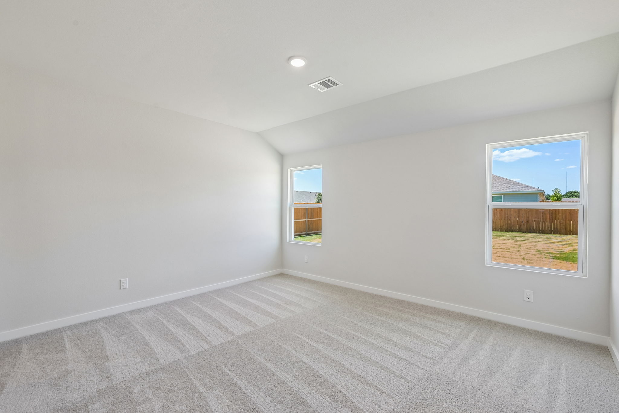 A room with a large window.