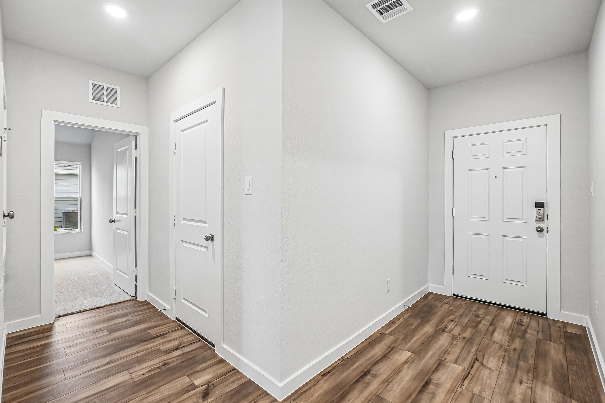 A room with white doors.