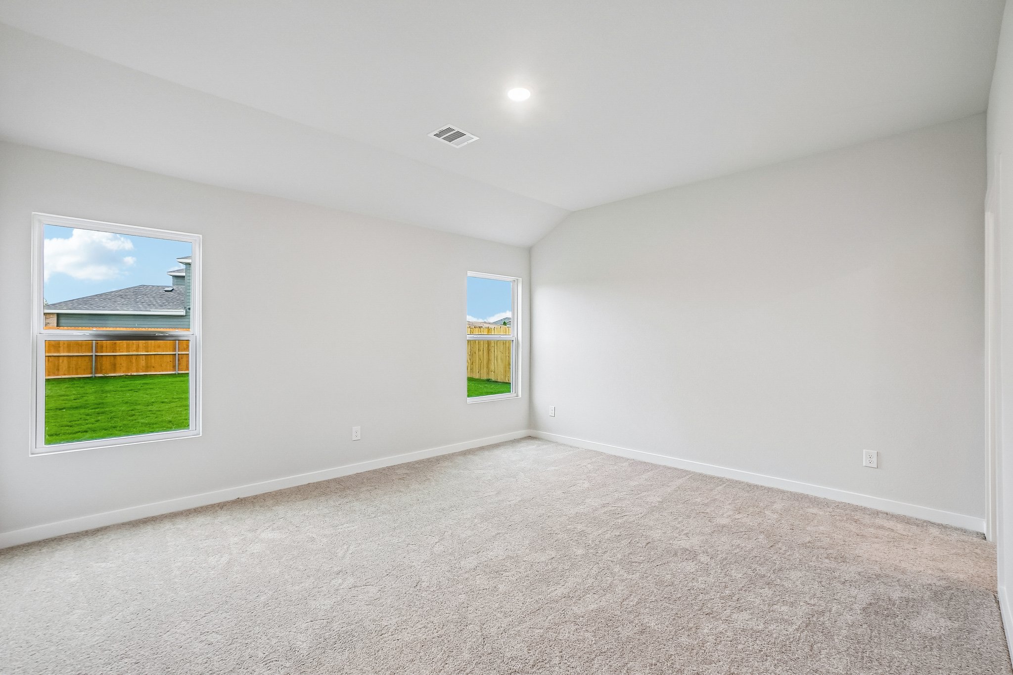 A room with a large window.