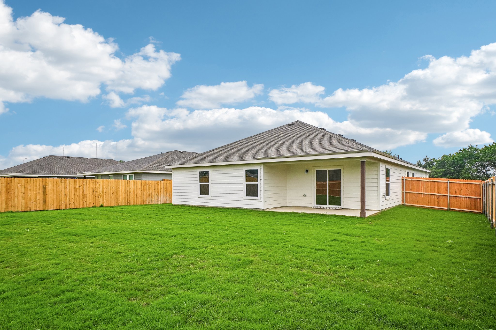 A house with a fence around it.