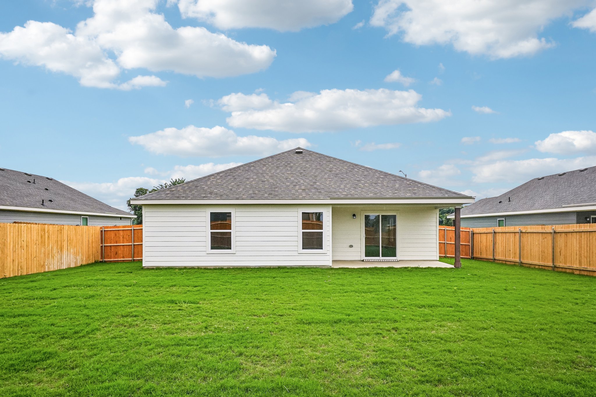 A house with a fence around it.