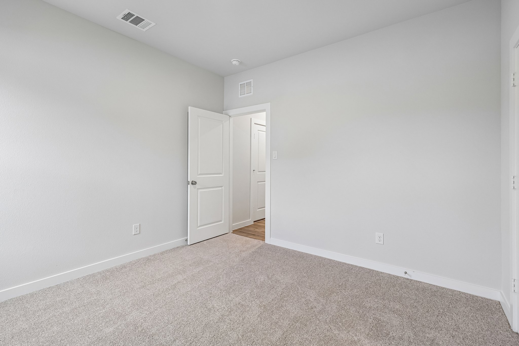 A room with white doors.