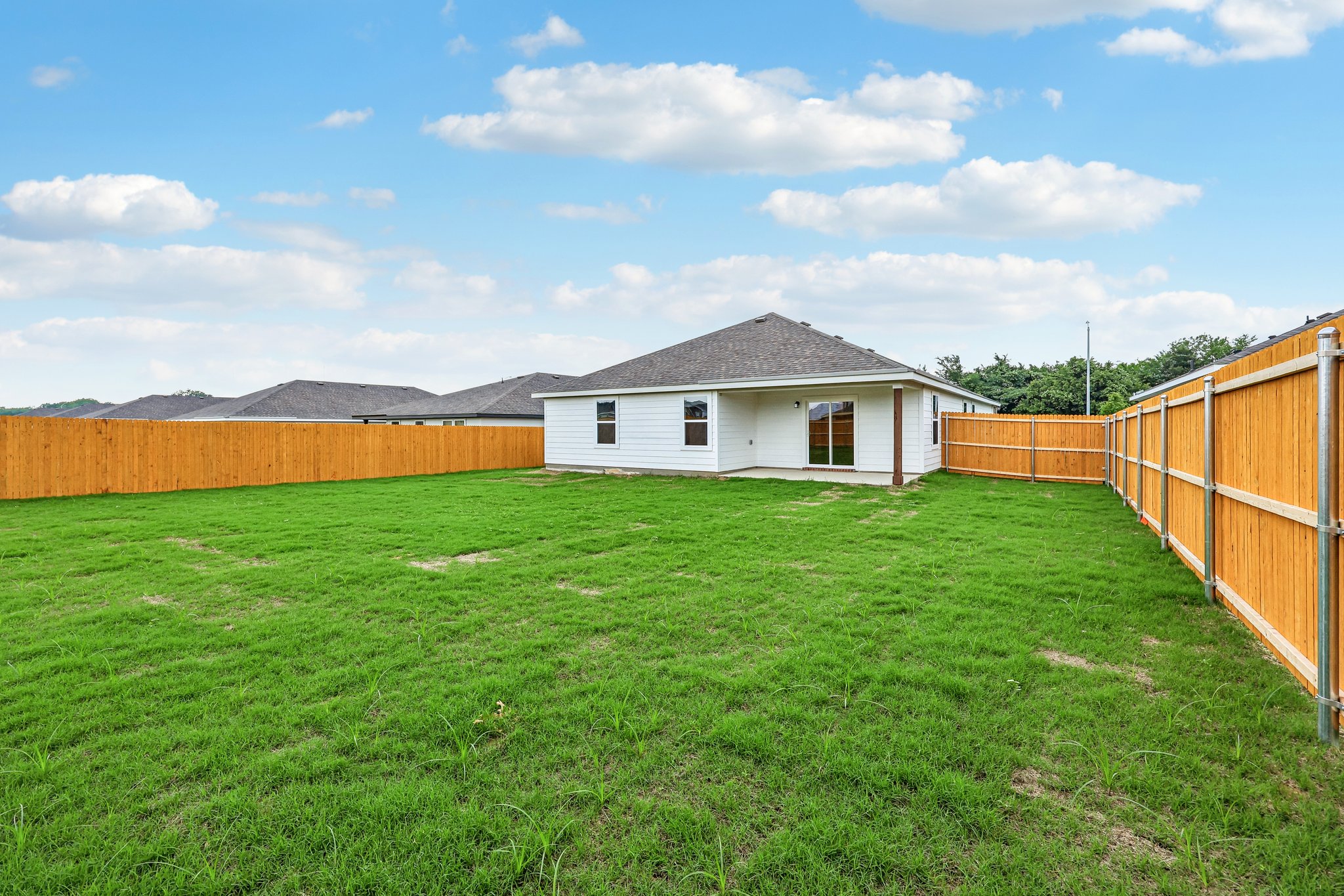 A house with a fence around it.