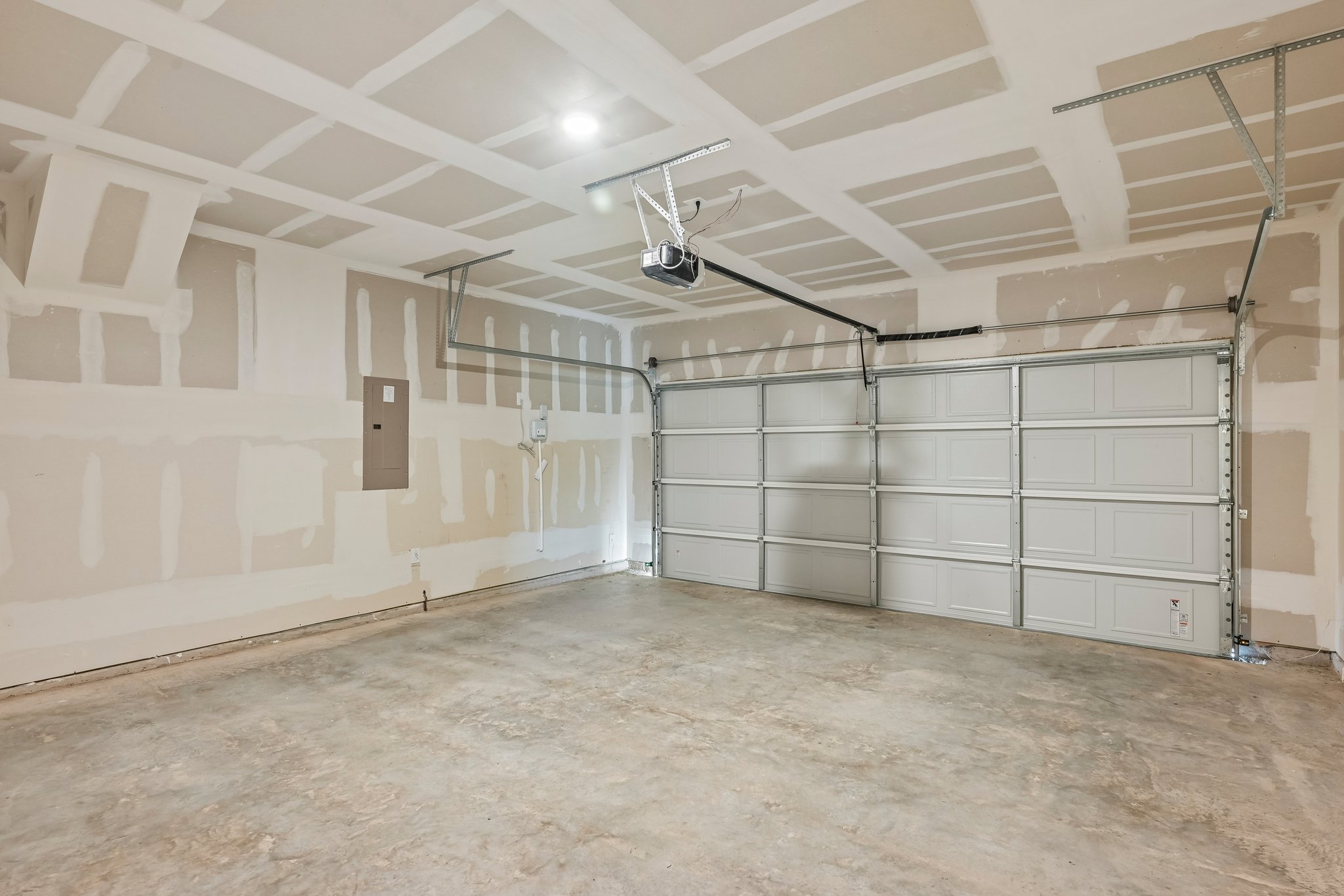 A room with a metal gate.